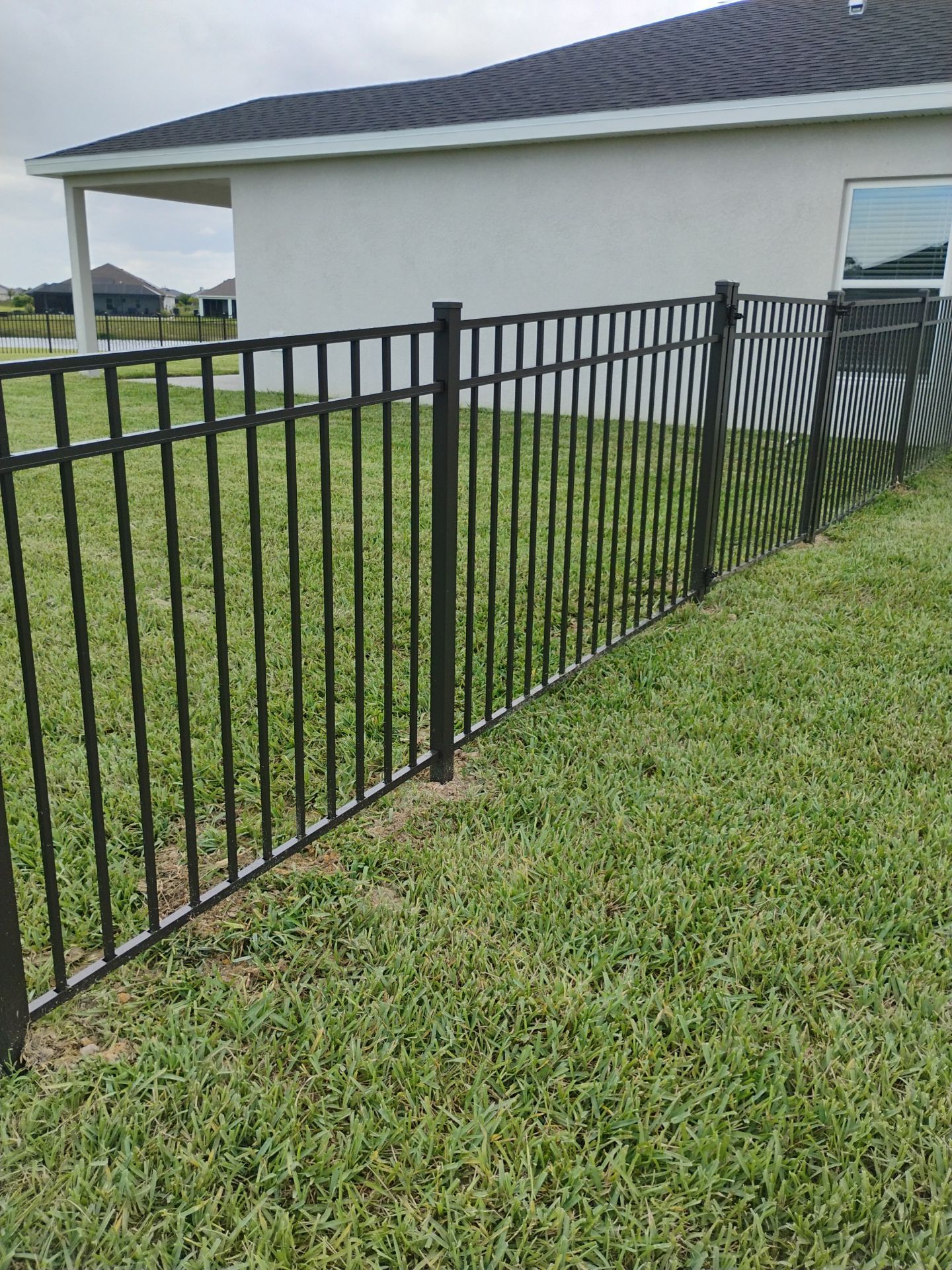 Black Aluminum Picket Fence Installation for Punta Gorda Residence by True Fence LLC