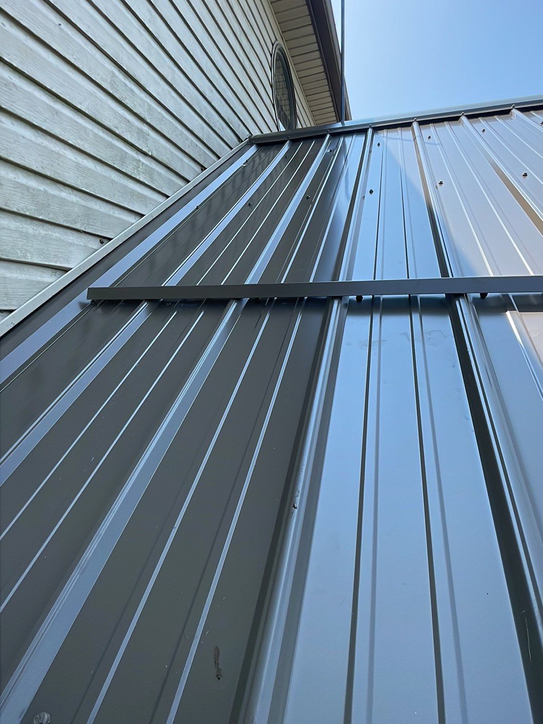Residential Roofing Installation using Performance Panel Metal - Burnished Slate by RoofX 