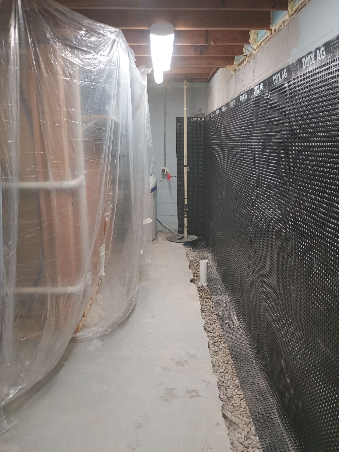 Depressurizing Denny's Basement Wall by Waterproofing Northeast