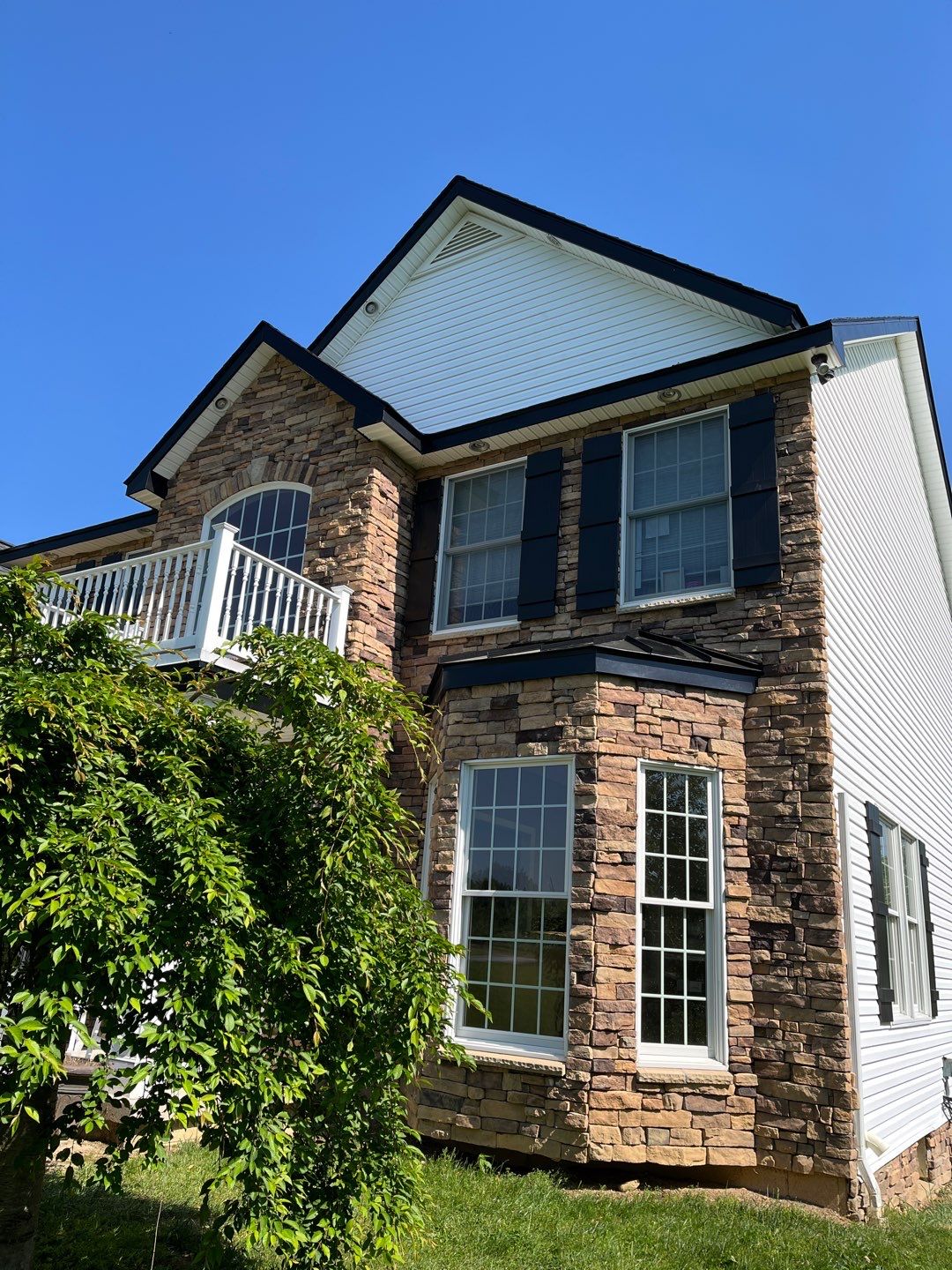 Roof Damage using Certainteed Lifetime Roofing System- Moire Black Landmark Pro shingkes with shadow ridge caps. by BulletpROOF Exteriors