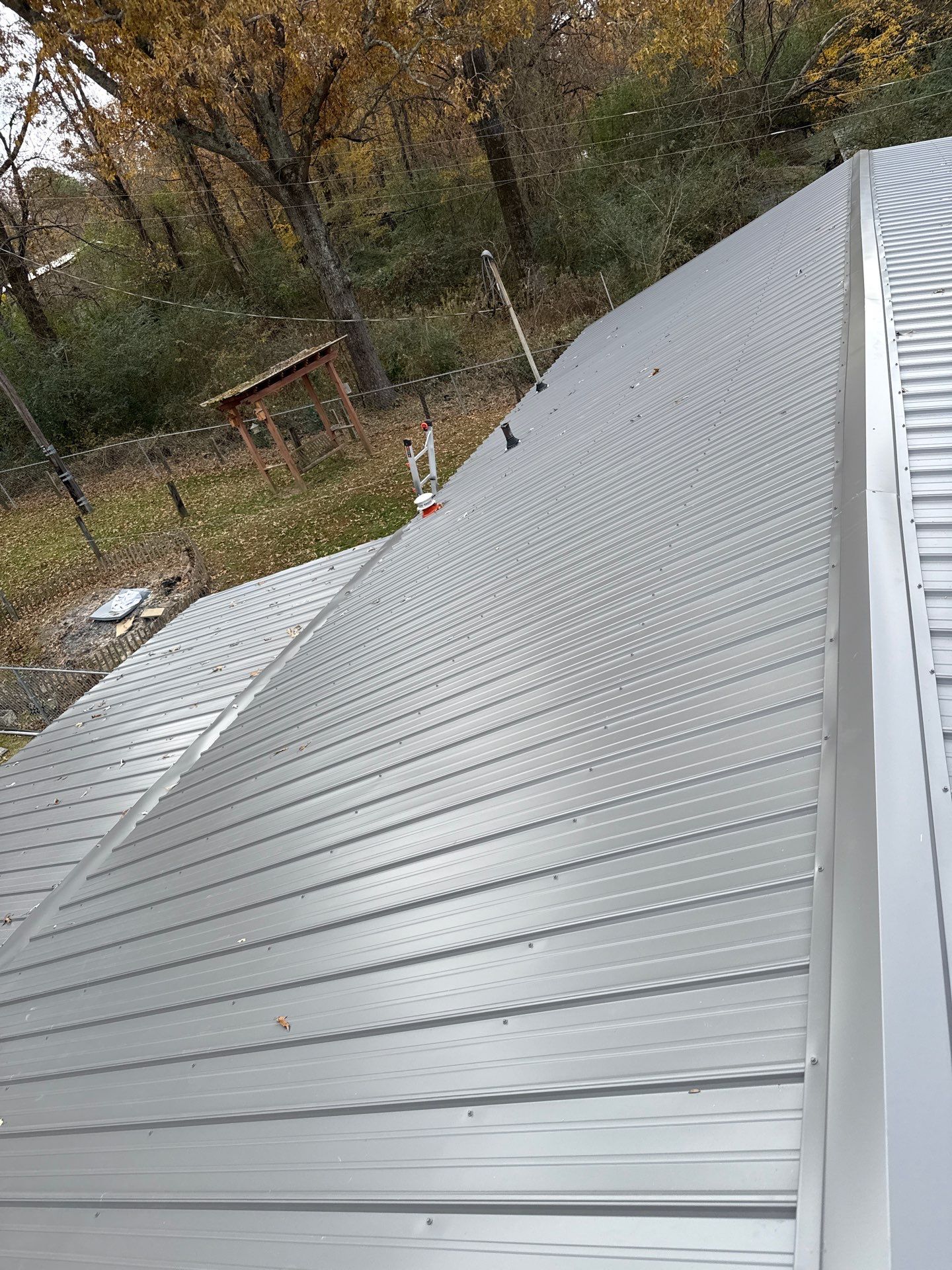 Roof Replacement in Pinson (Metal Roof) by The Roofing Dudes