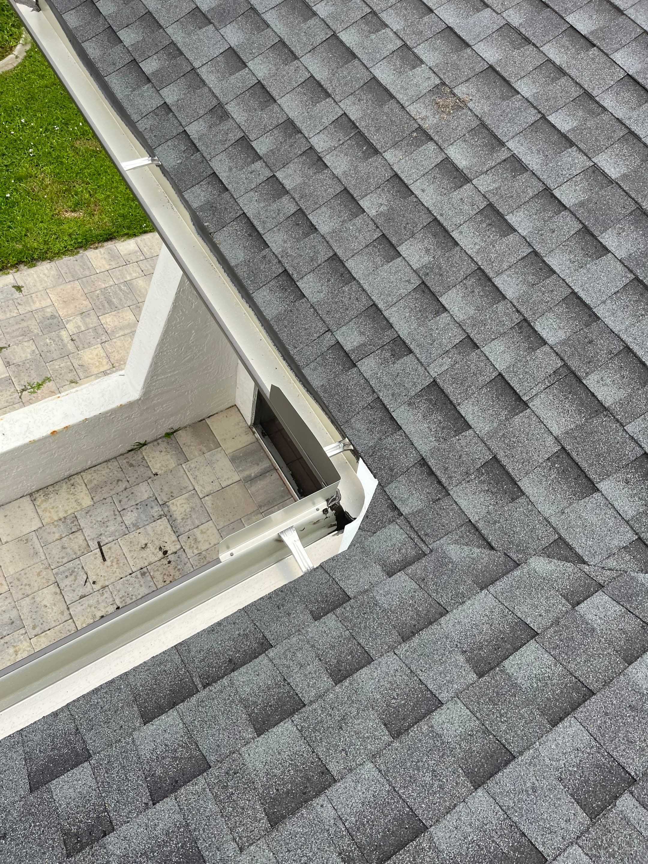 Black Seamless Gutters for a Modern Look in Cape Coral FL by Gutter Professors