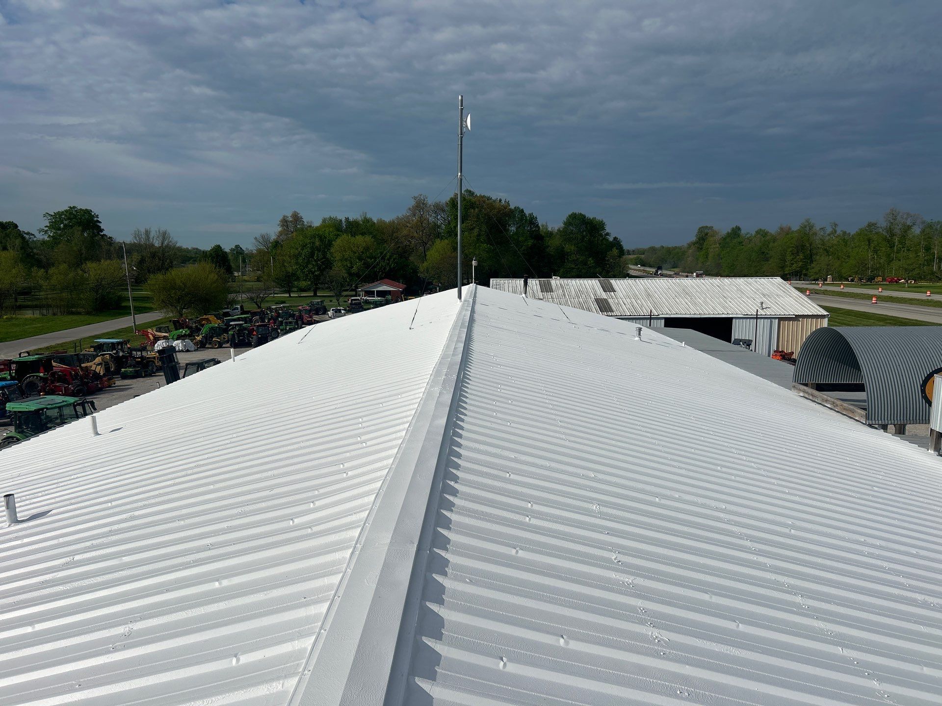 Commercial Metal Roofing Restoration using Coatings by Kentucky Commercial Roofing