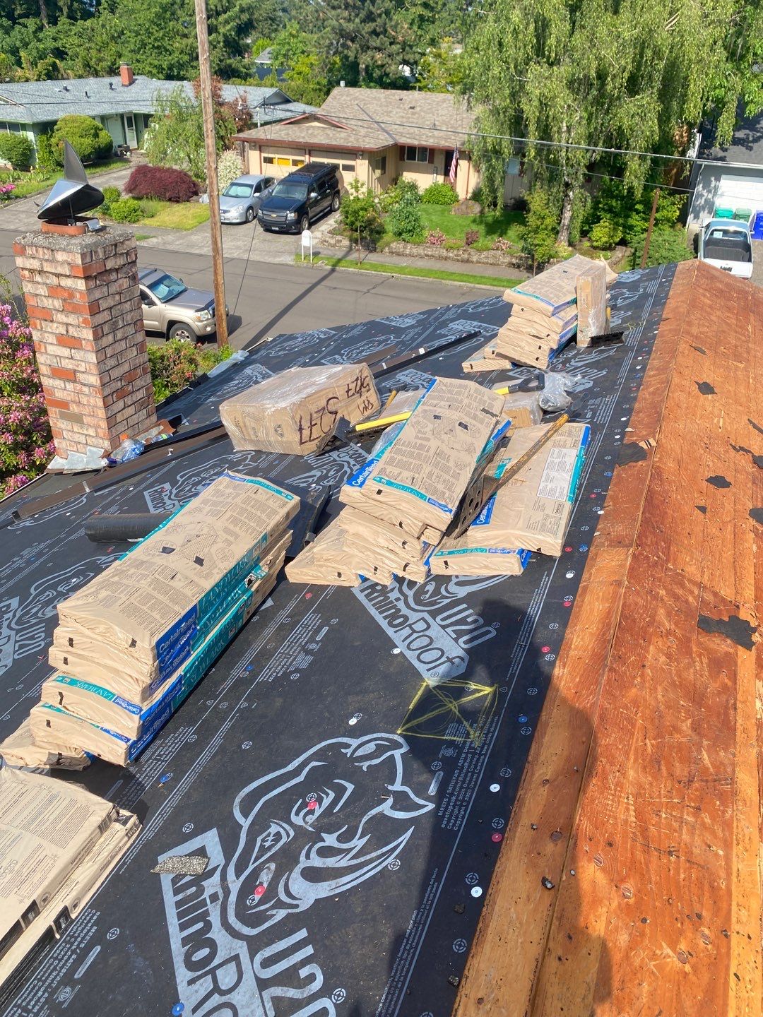 Onyx Black Shingles by Reimagine Roofing