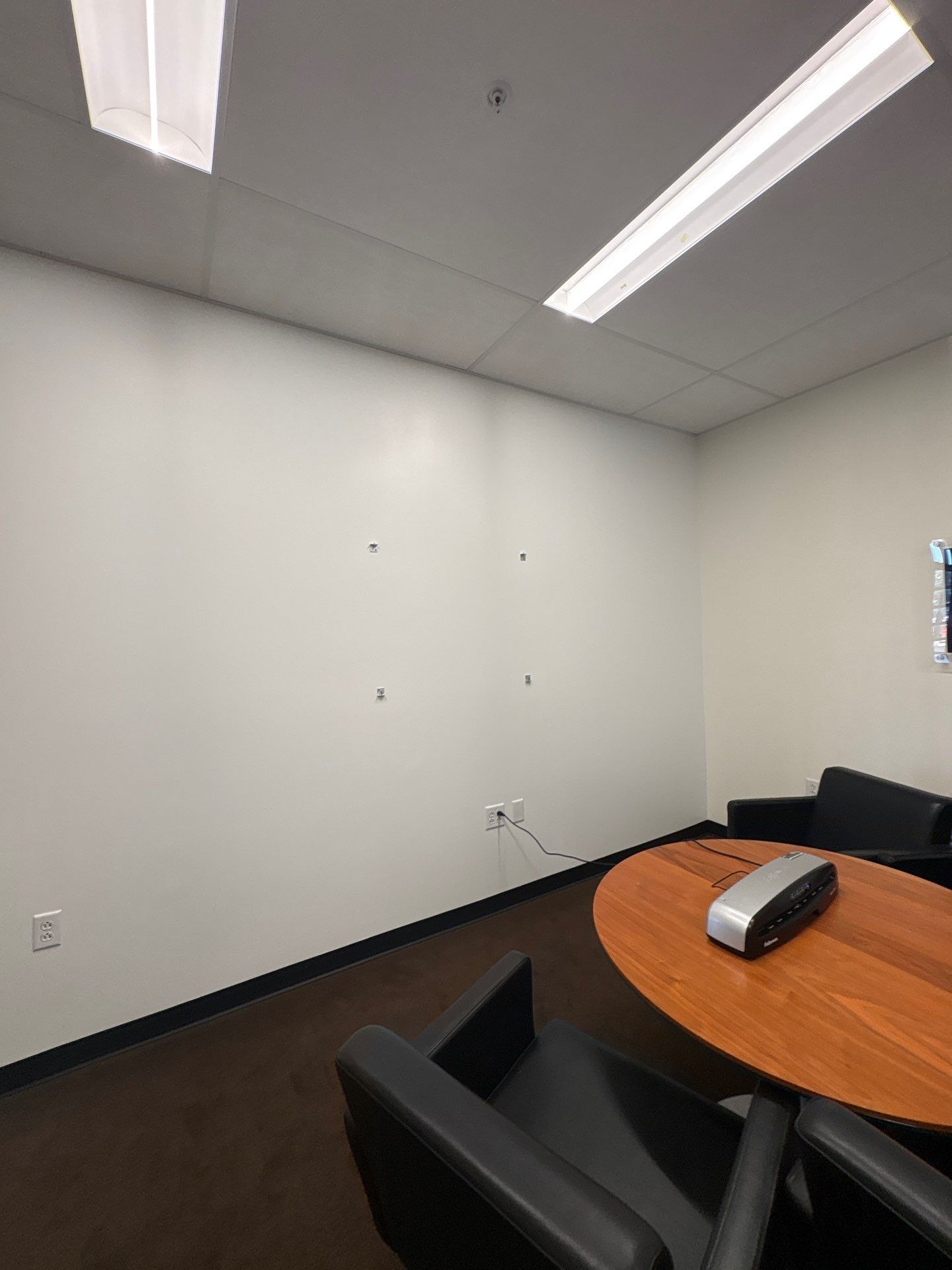 Interior Painting and Drywall Patching for Sioux Falls Commercial Showroom by Select Painting, Coatings & Garage Cabinets