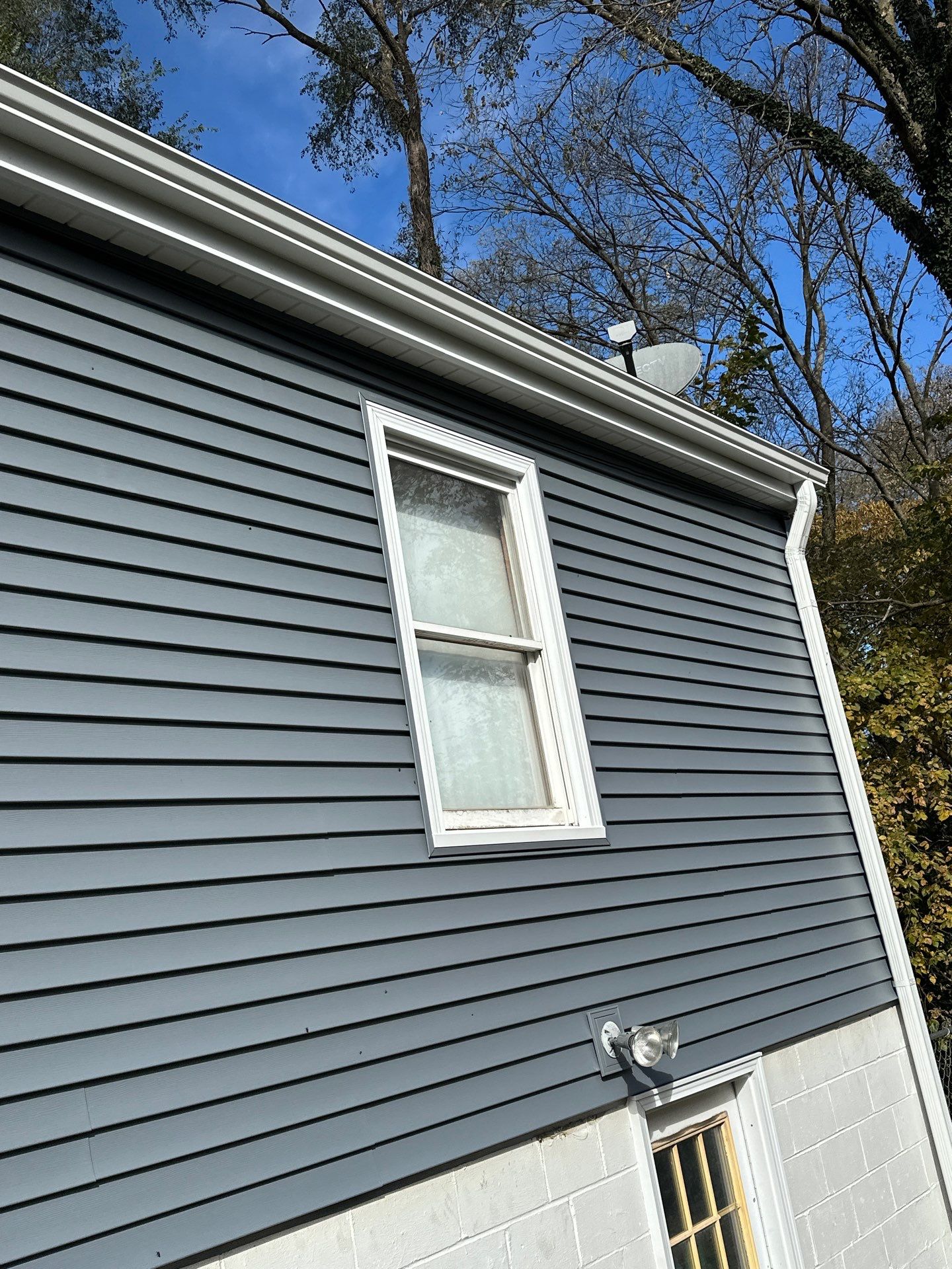 Feeling Blue in Weston Mo - Time for a Makeover by EEC Windows, Siding & Roofing
