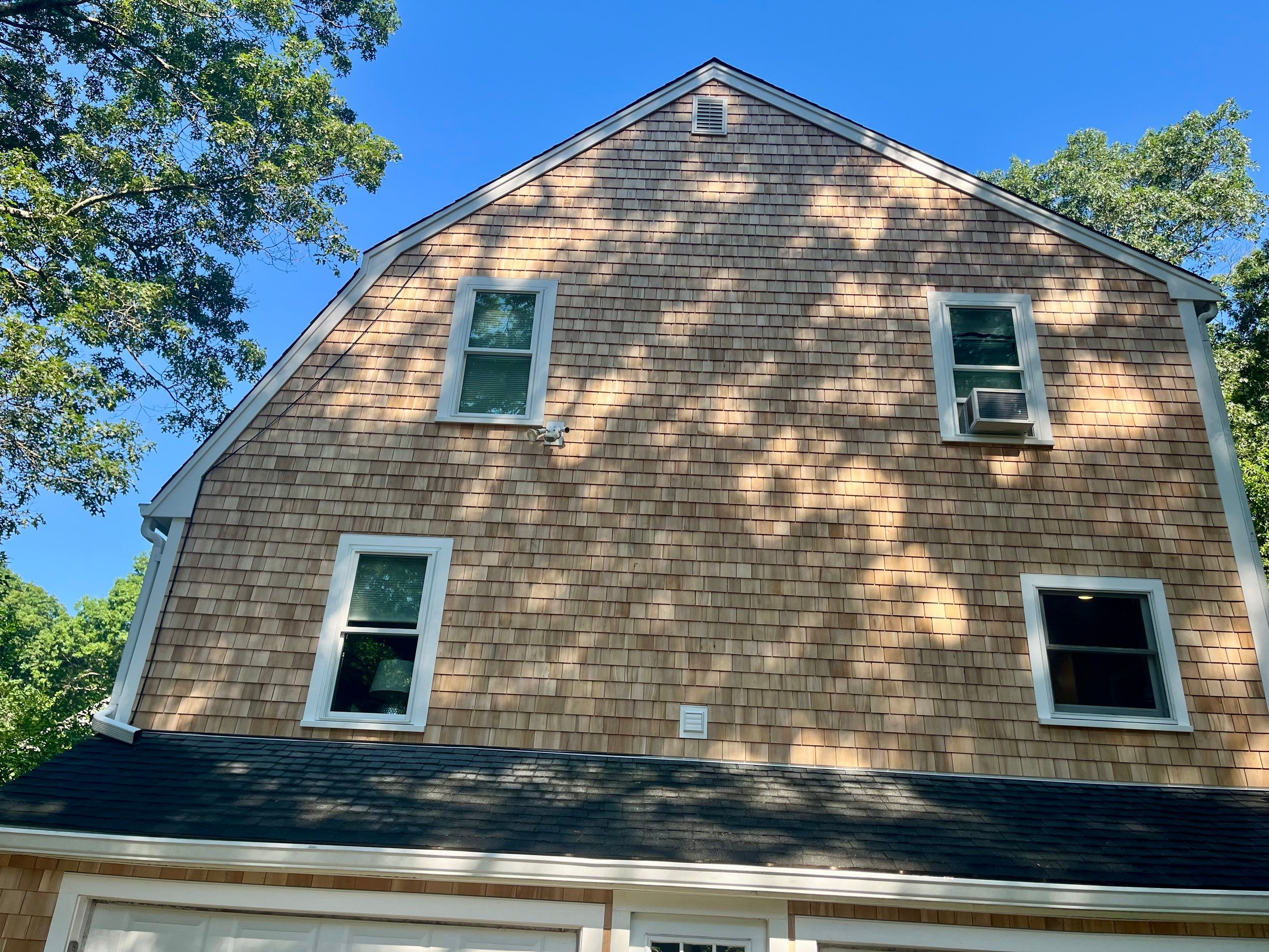 Partial residing project with Red Cedar shingles in Duxbury, MA by UBrothers Construction