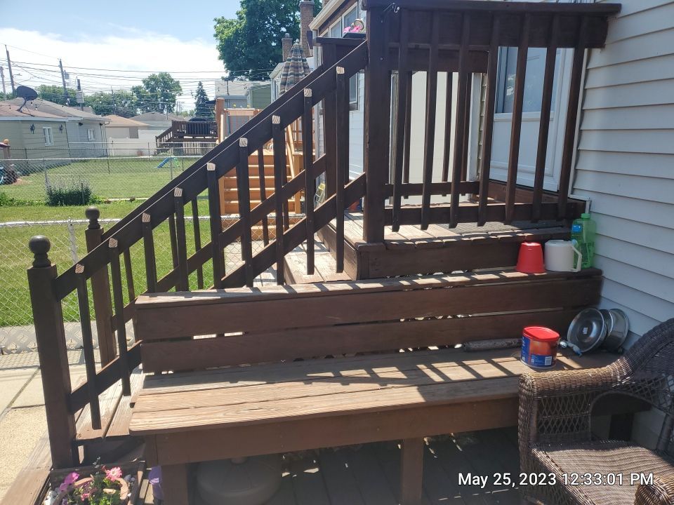 Wood cleaning and staining using Armstrong cloark oil stain by Northern Power Washing LLC.