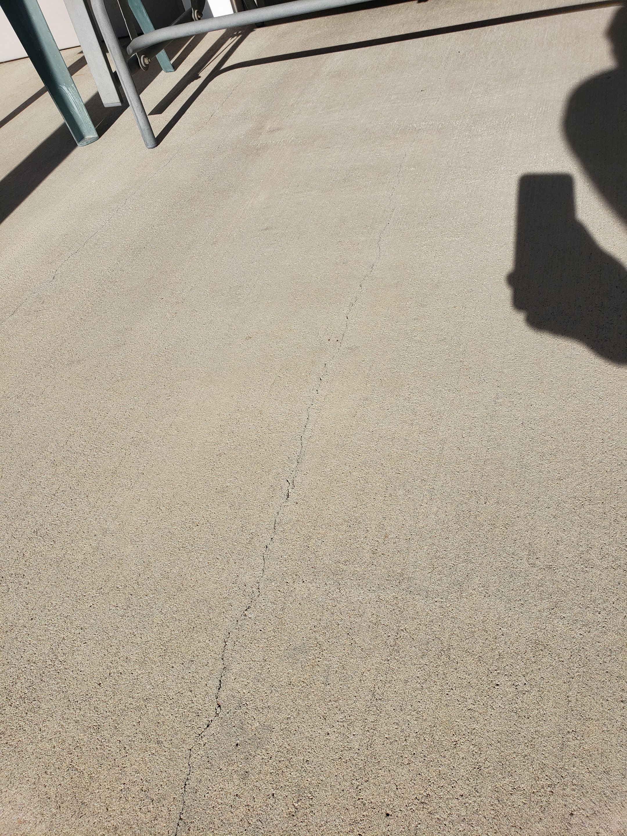 St. Joseph -- Front Patio and Garage Epoxy Garage Coating System by Big Red Decorative Concrete, LLC