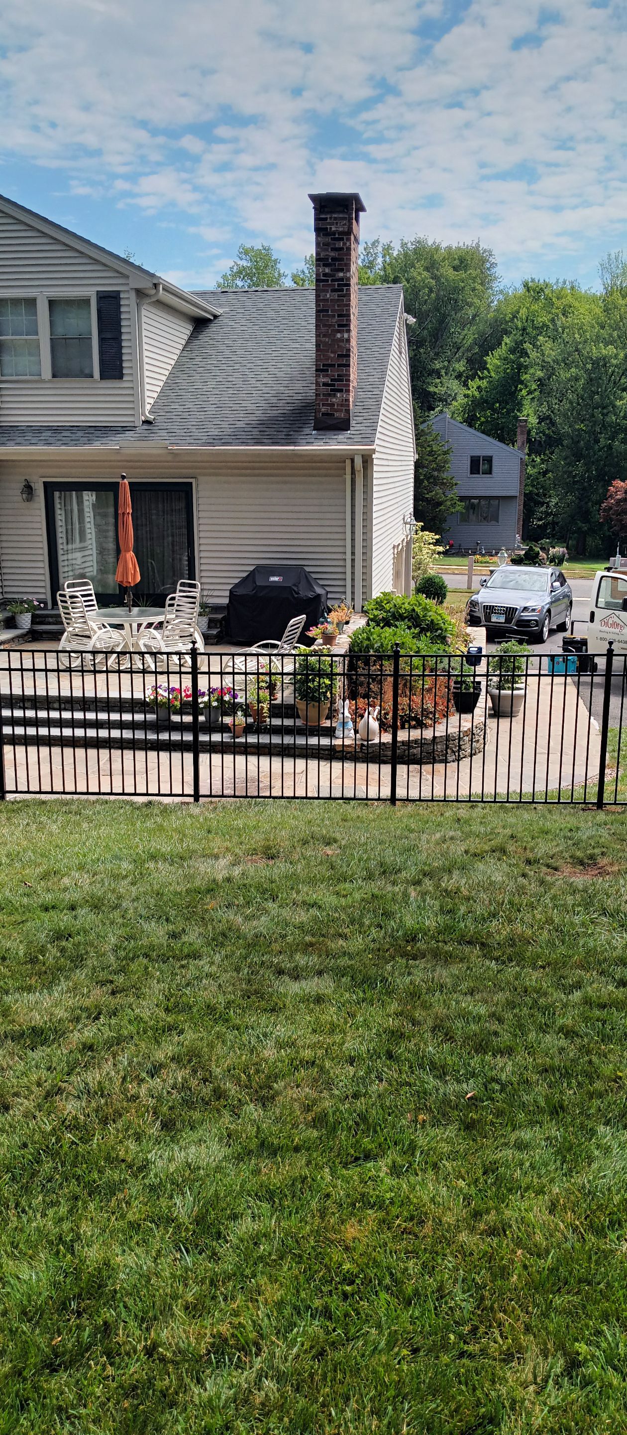 New Black Aluminum fence with matching gates by DiGiorgi Roofing and Siding Inc