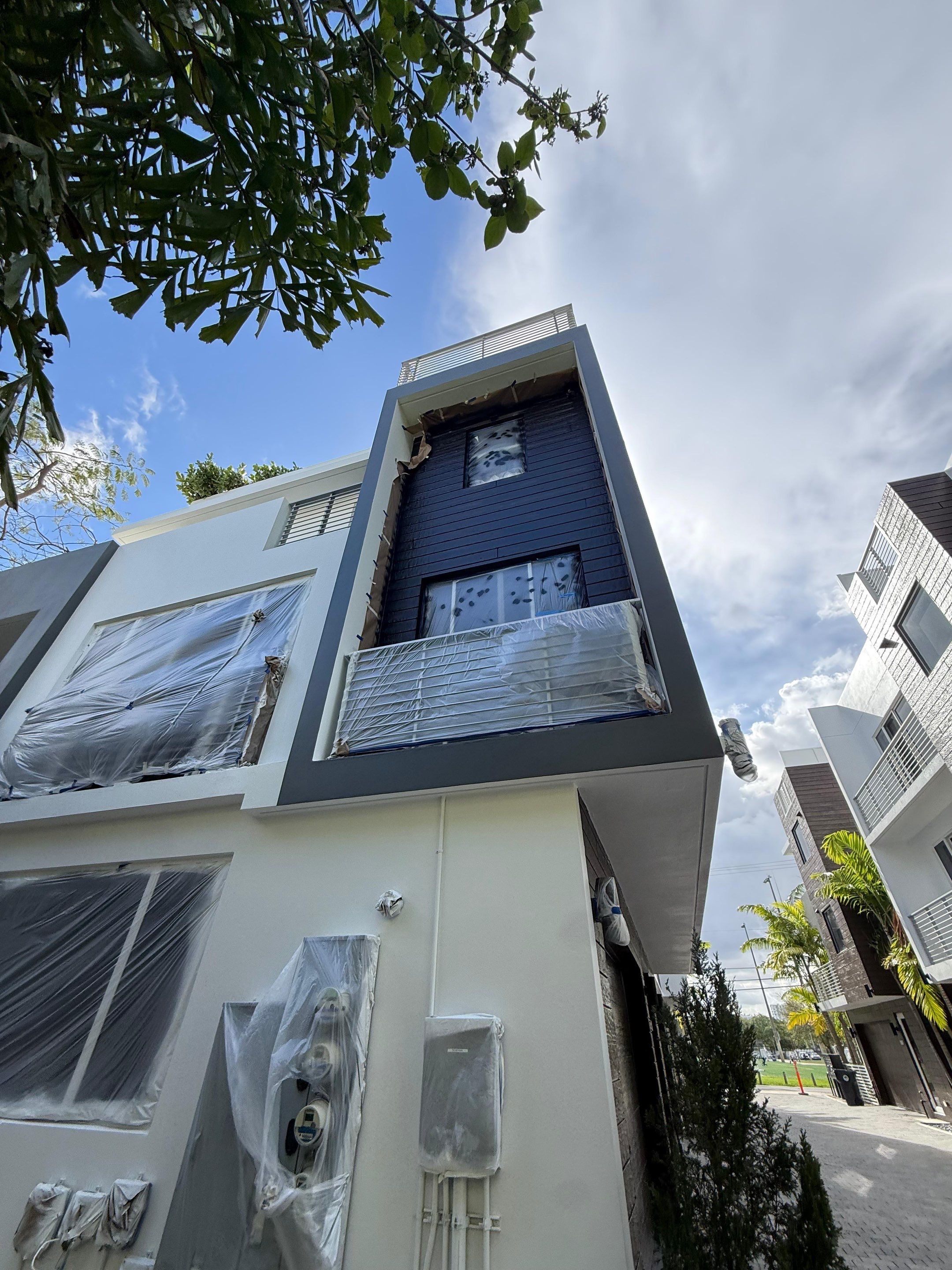 Fort Lauderdale Town Homes Exterior Painting by John “The Greek” Painting