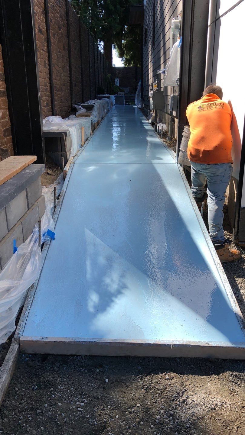 Bruce | Broom Finish Driveway, Concrete Project by Jireh Asphalt & Concrete Inc 