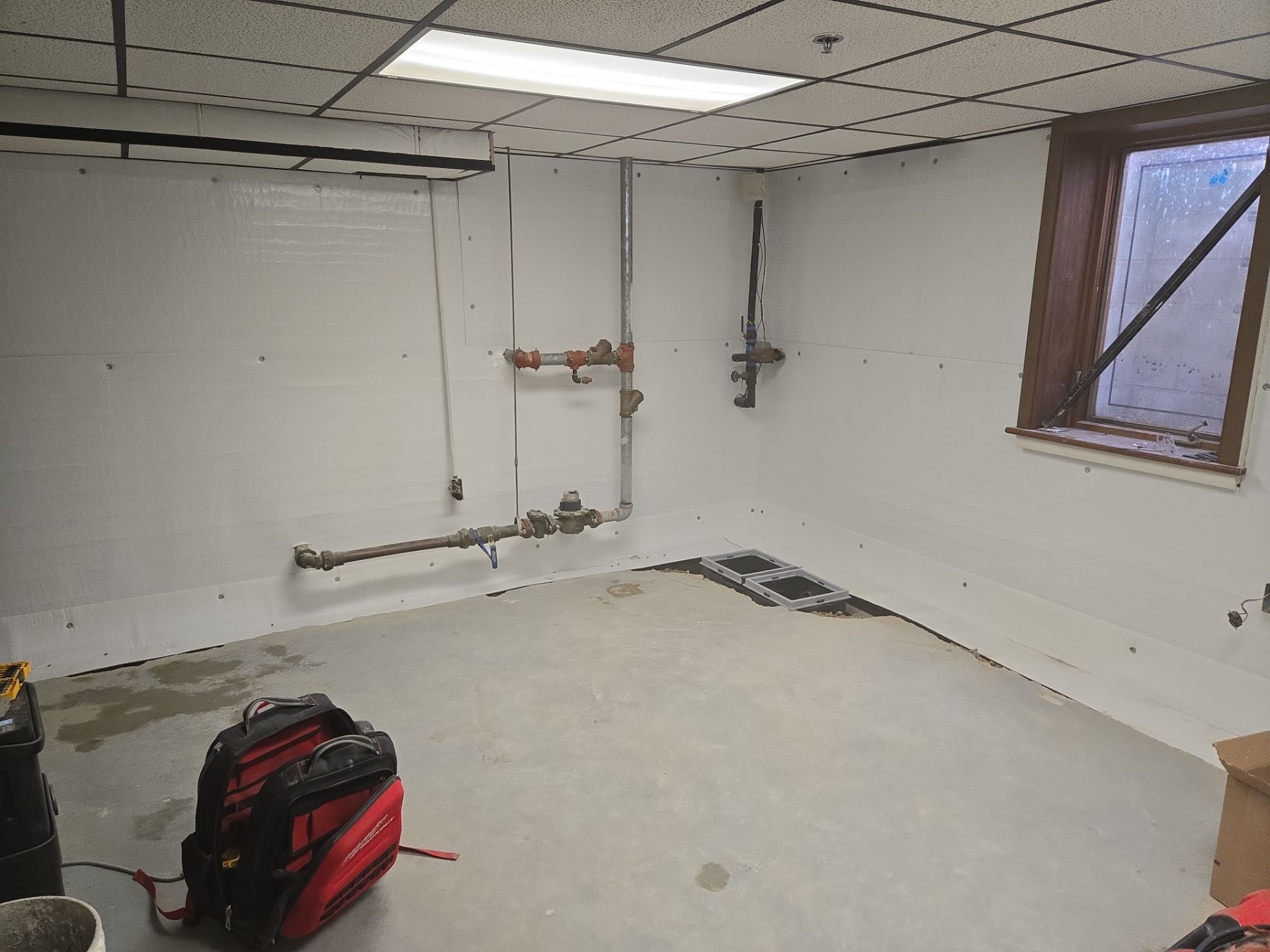 Interior Basement Waterproofing System with Embedded Fiber Reinforcement by Toledo Basement Repair 
