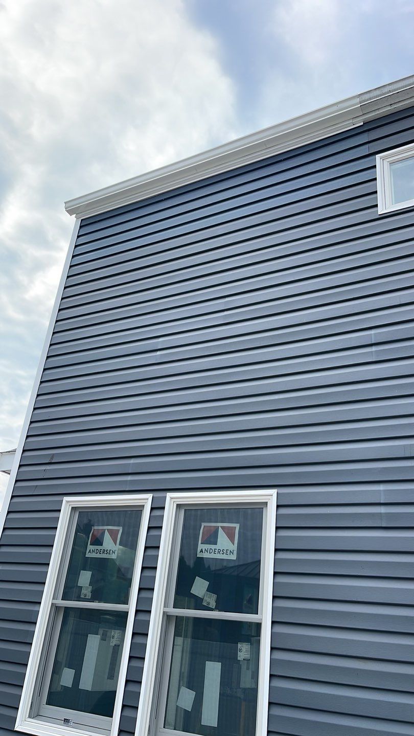 Gutter Installation using 5"white K style seamless gutters and 2x3 white leaders by Above All Gutters 