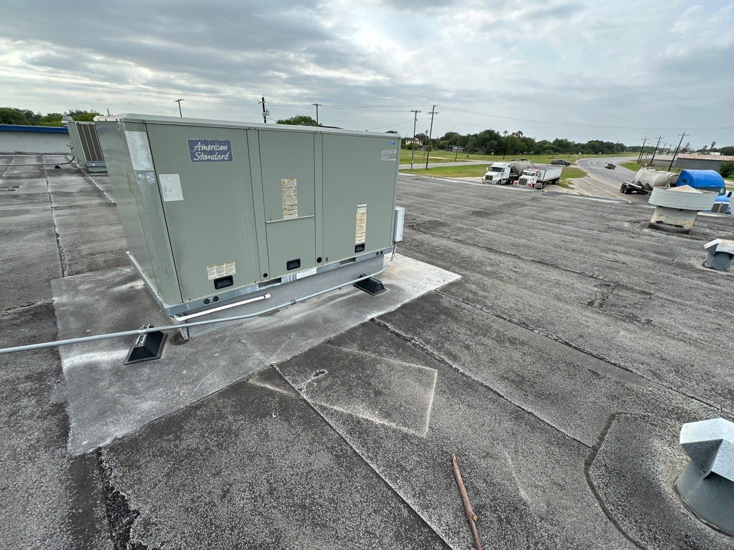 Commercial Silcone Roof Repair using Silcone Coating by Galvan Roofing and Construction
