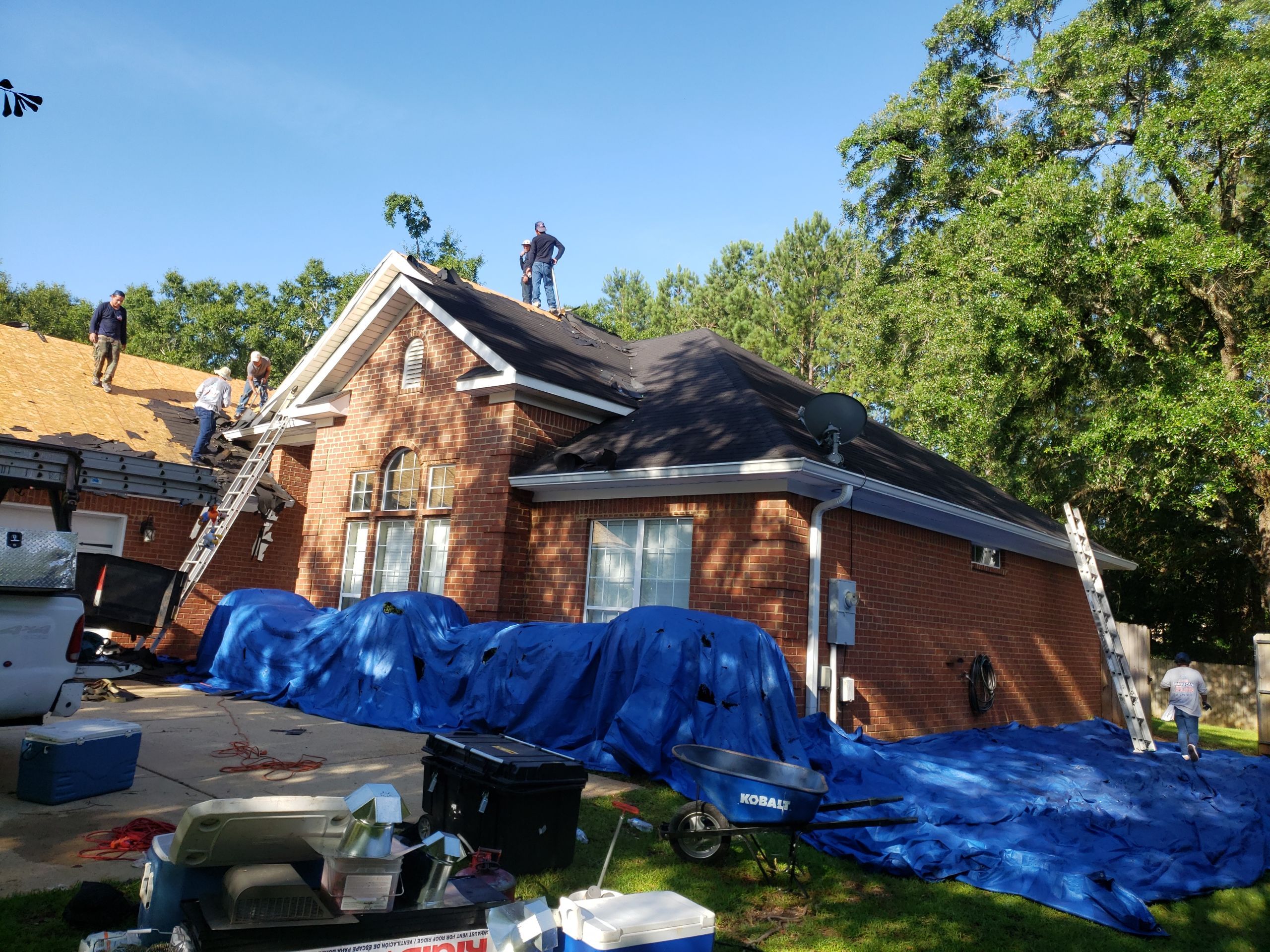 Residential Roofing Installation using Roof Replacement by American Roofing & Construction LLC