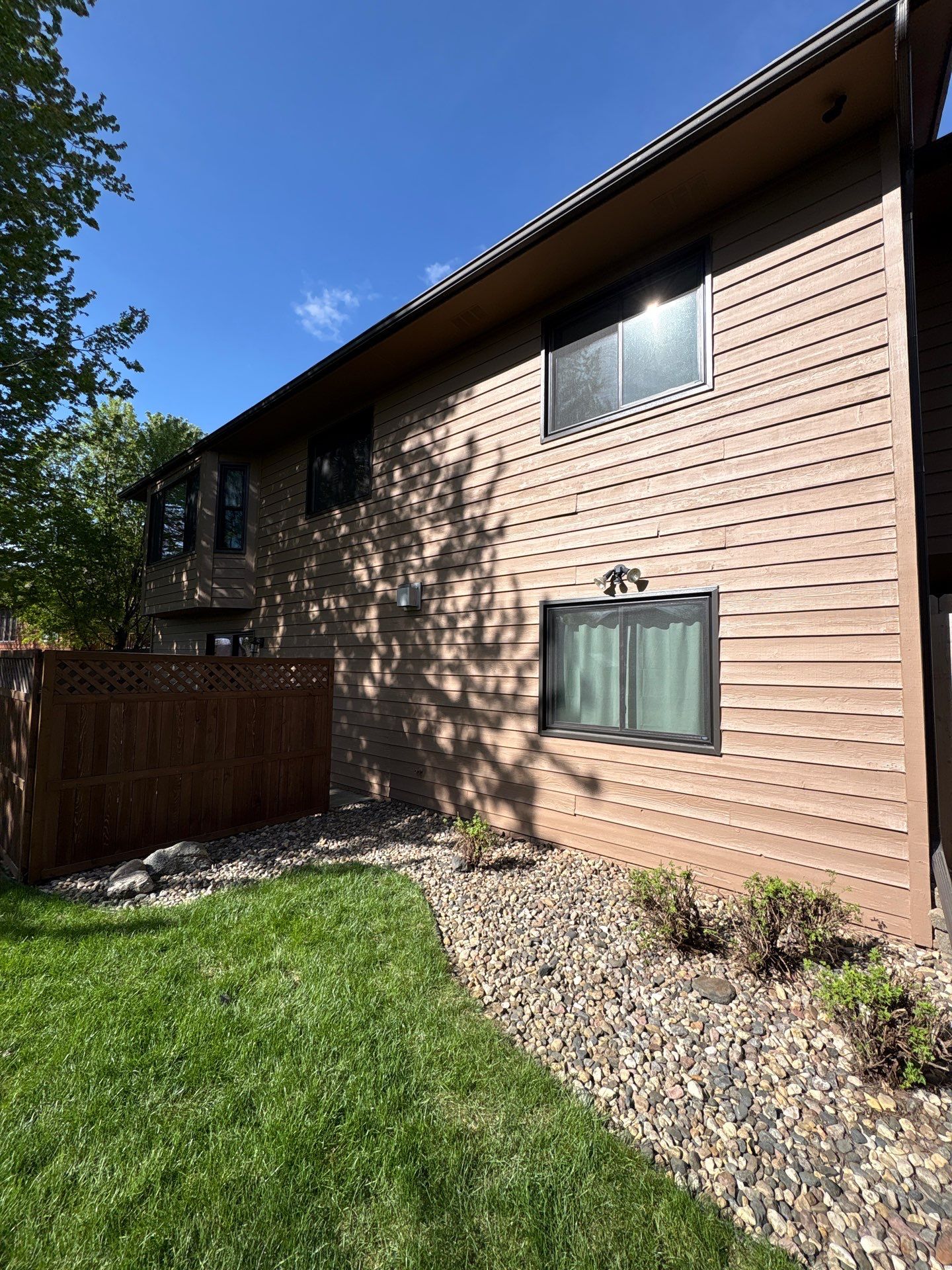 Wood Siding Restoration and Exterior Painting in Sioux Falls by Select Painting, Coatings & Garage Cabinets