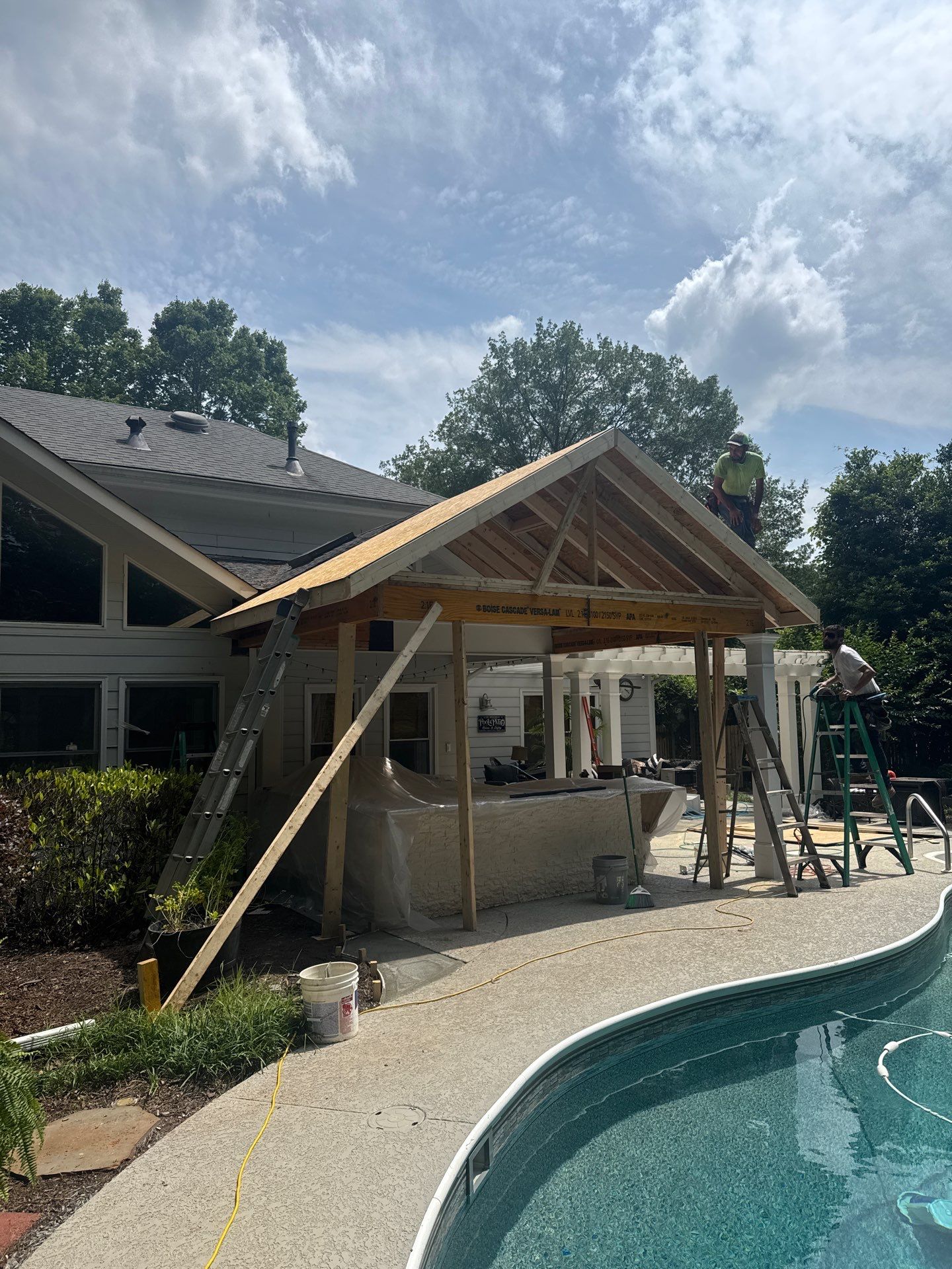 Marietta Poolside Pavilion with Custom Outdoor Kitchen and Pergola by Swift Home Renovations