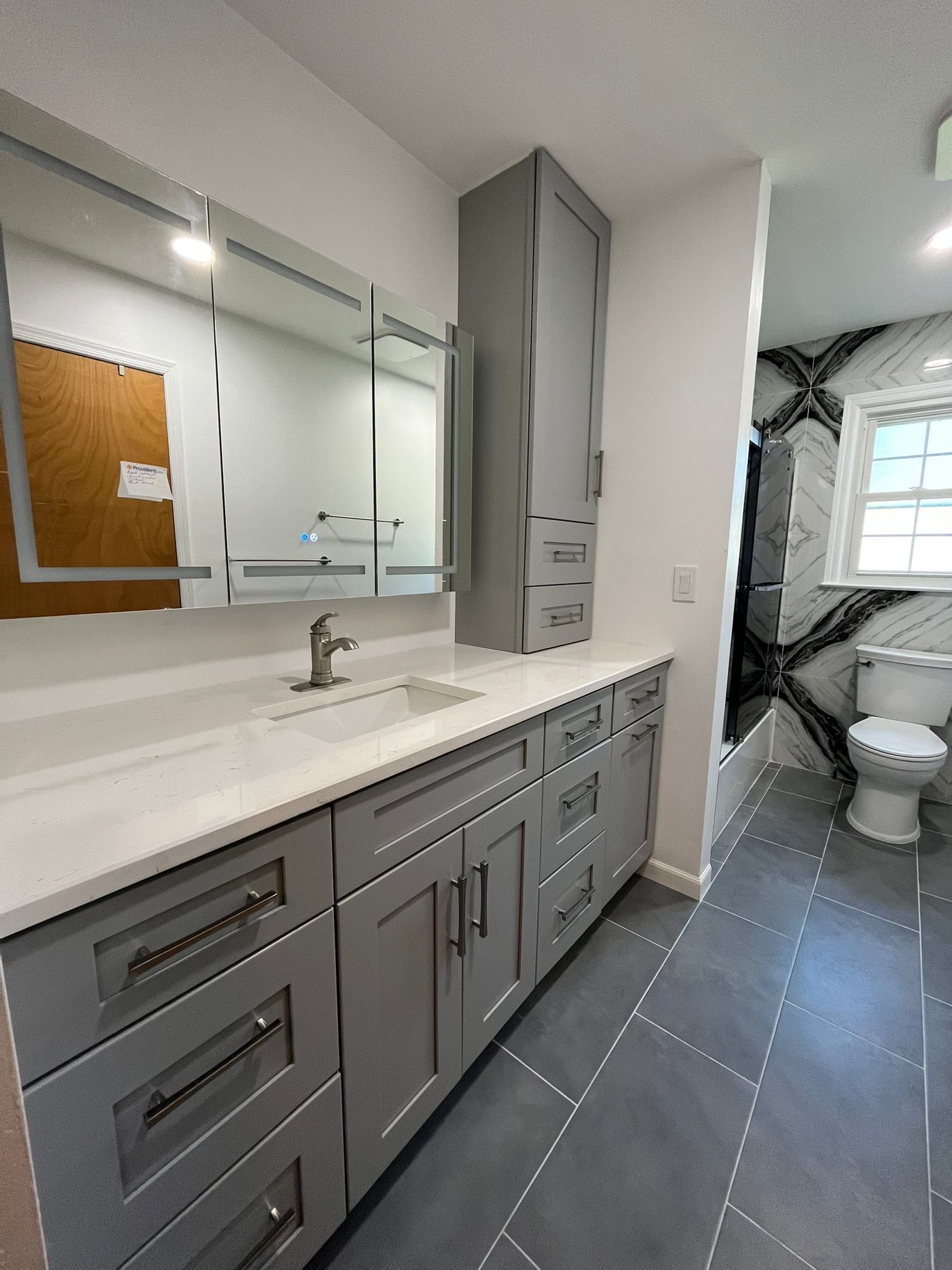 Bathroom Remodel using Tile by Home Concepts Construction