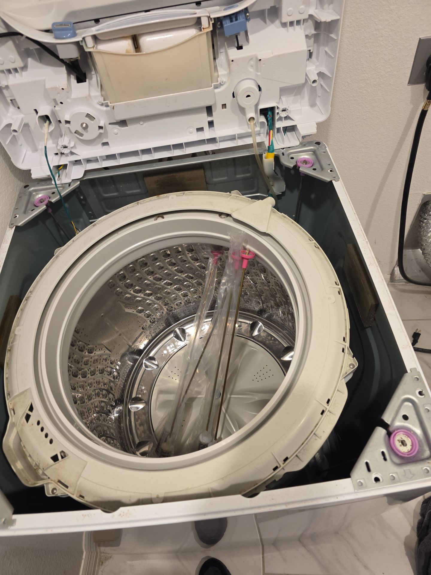 Samsung Top-Loading Washing Machine Suspension Rod Repair in Groveland by AMB-WORKS APPLIANCE REPAIR
