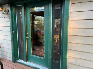 Exterior Entry Door and Garage Door Painting by Legendary Services Company LLC.