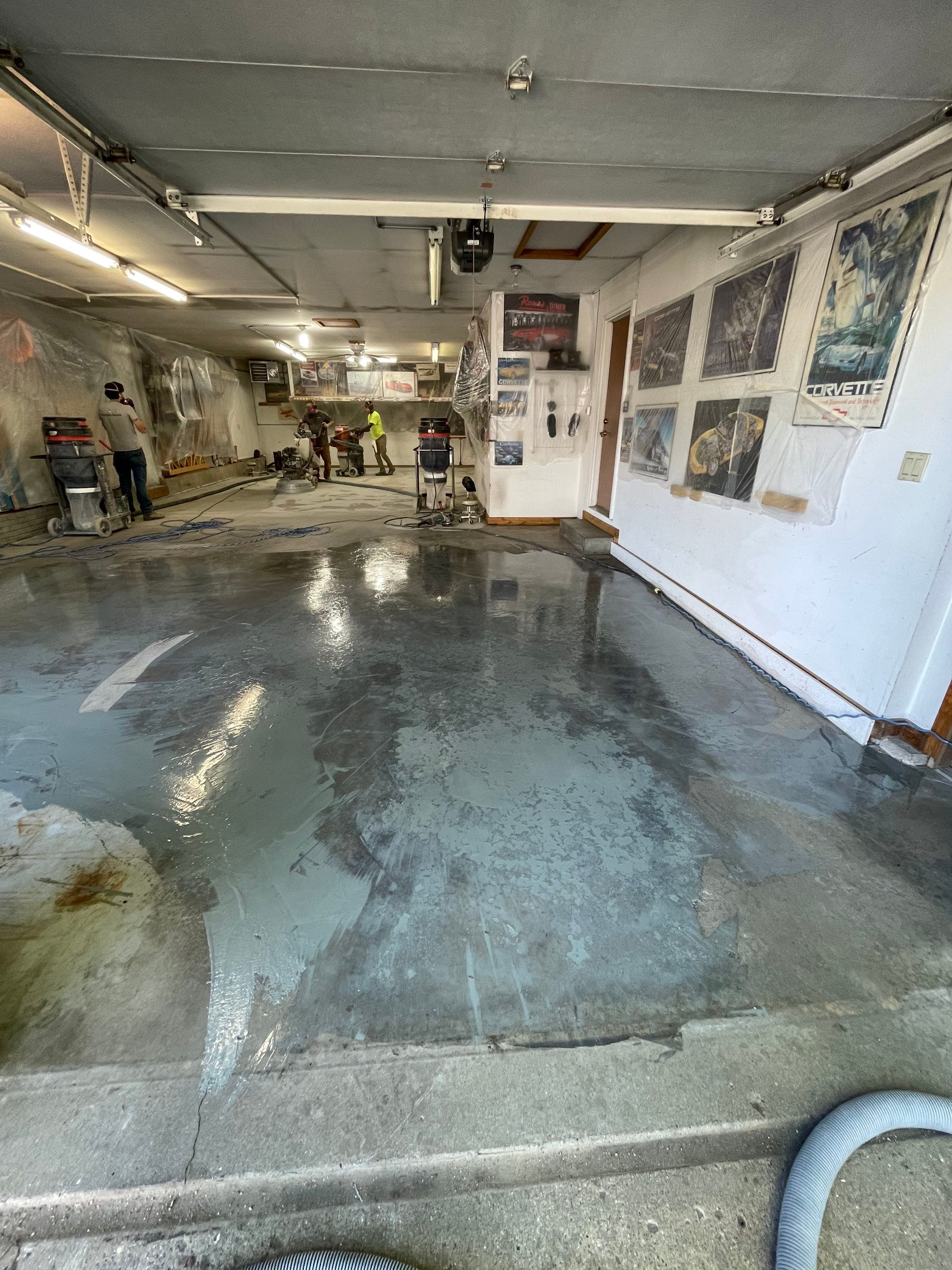 High-Performance Polyurea Garage Floor Coating and Stem Wall Finishing in Sioux Falls by Select Painting, Coatings & Garage Cabinets