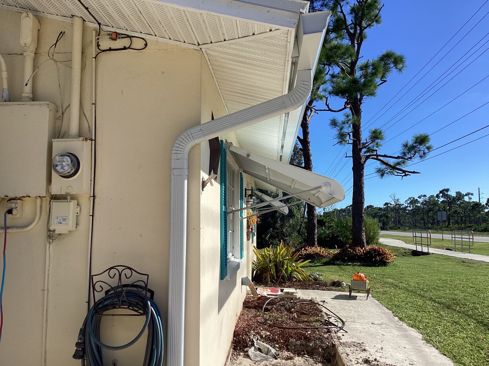 3x4 Downspouts and Seamless Gutters for Coastal Homes in St James City FL by Gutter Professors