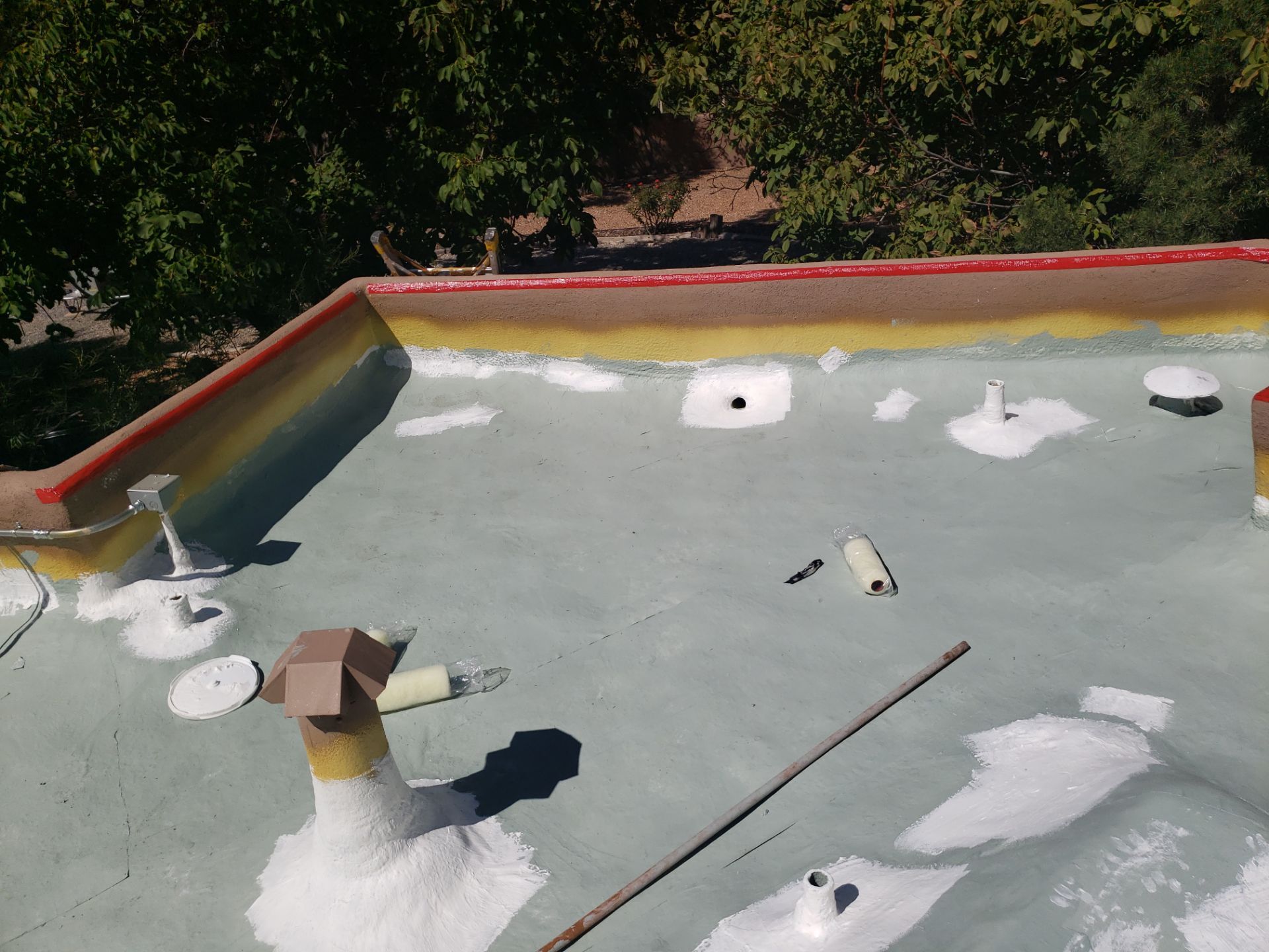 Residential roof application by SPF Services 