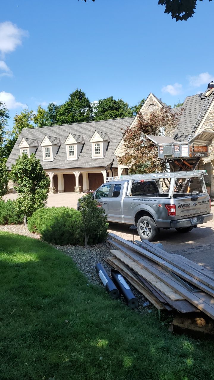 NEW CertainTeed Grand Manor from old Cedar Shake! by Absolute Roofing and Construction