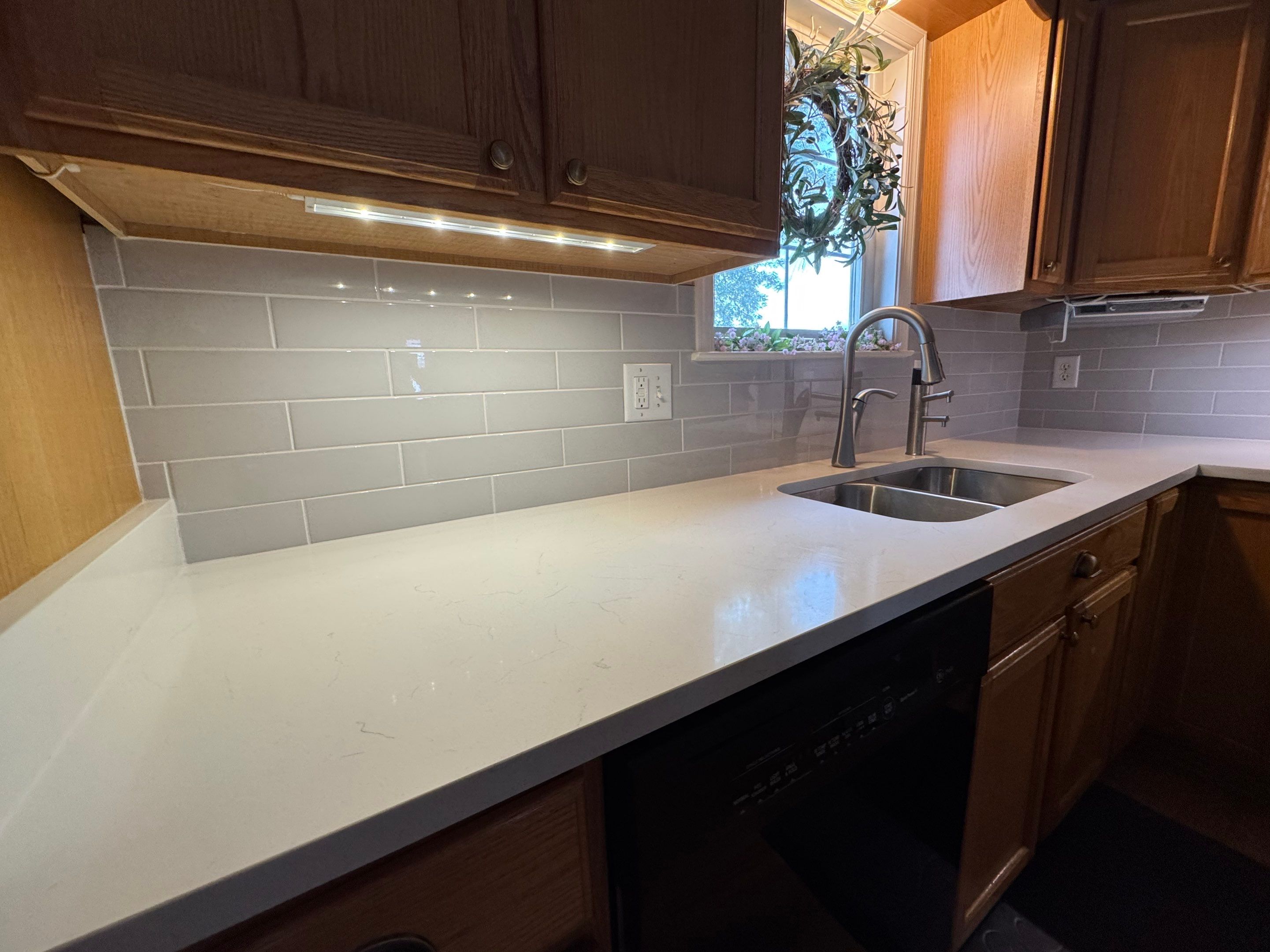 Little Kitchen Backsplash by Integrity Tile and Home LLC
