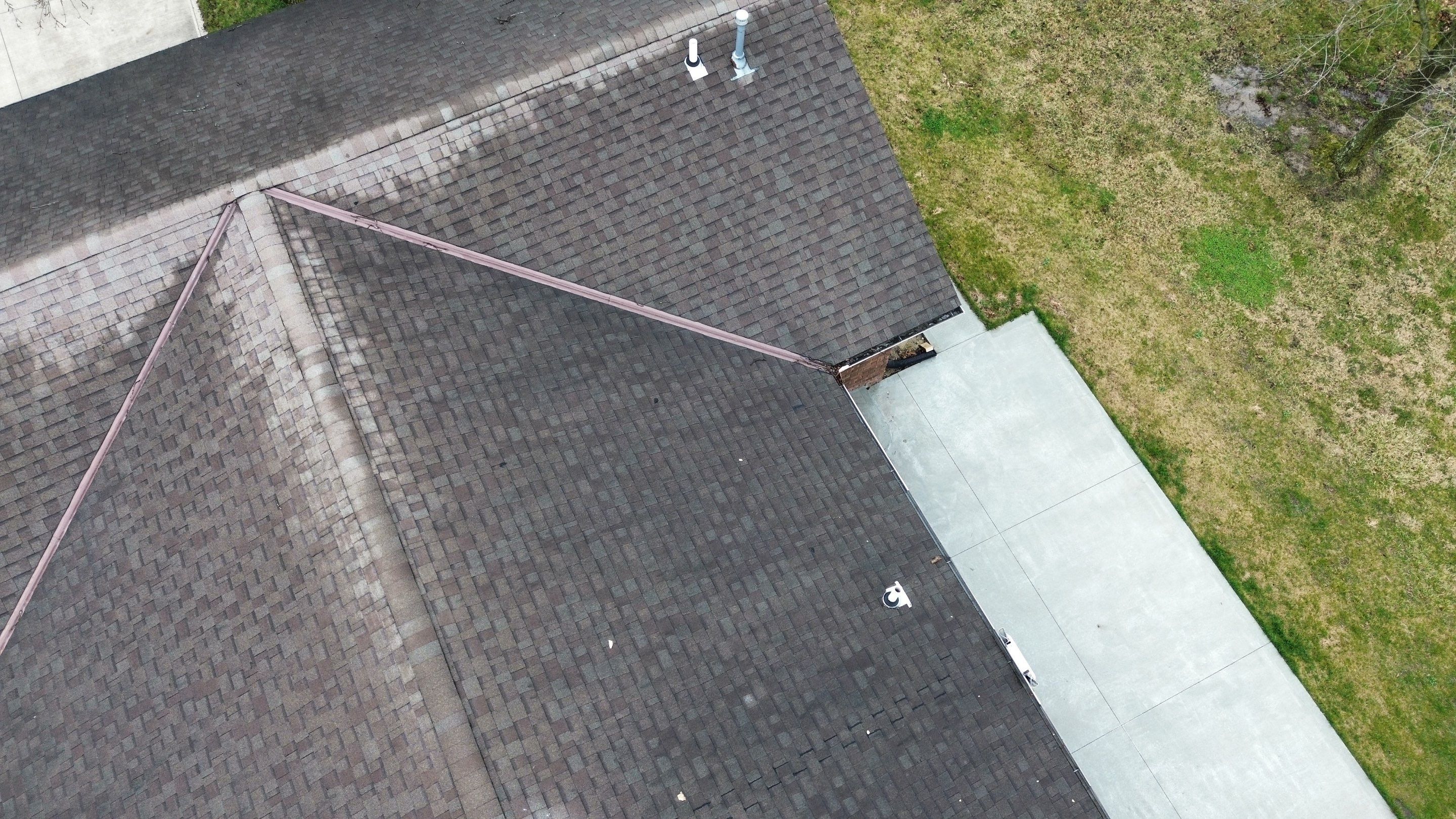 Residential Roofing Installation using Performance Panel Metal - Crinkle Bronze by RoofX 