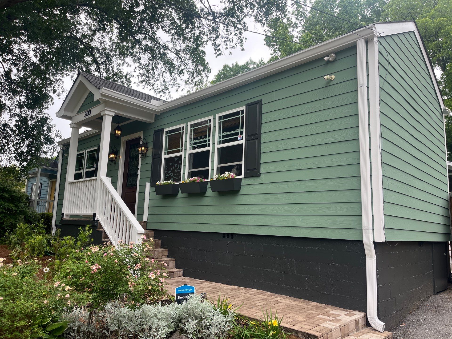Exterior Painting using Sherwin Williams SuperPaint and Porch Repairs by Nelson Exteriors