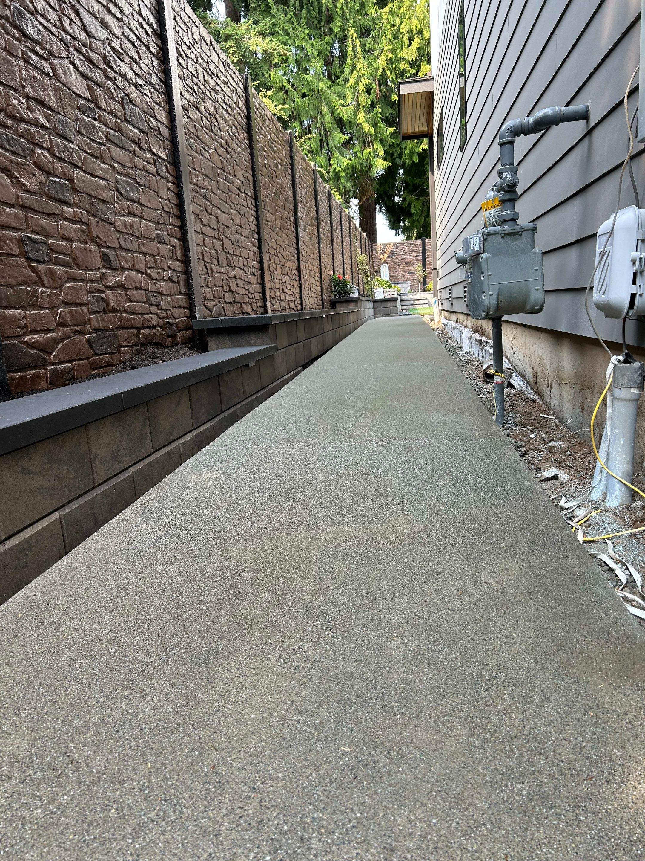 Bruce | Broom Finish Driveway, Concrete Project by Jireh Asphalt & Concrete Inc 