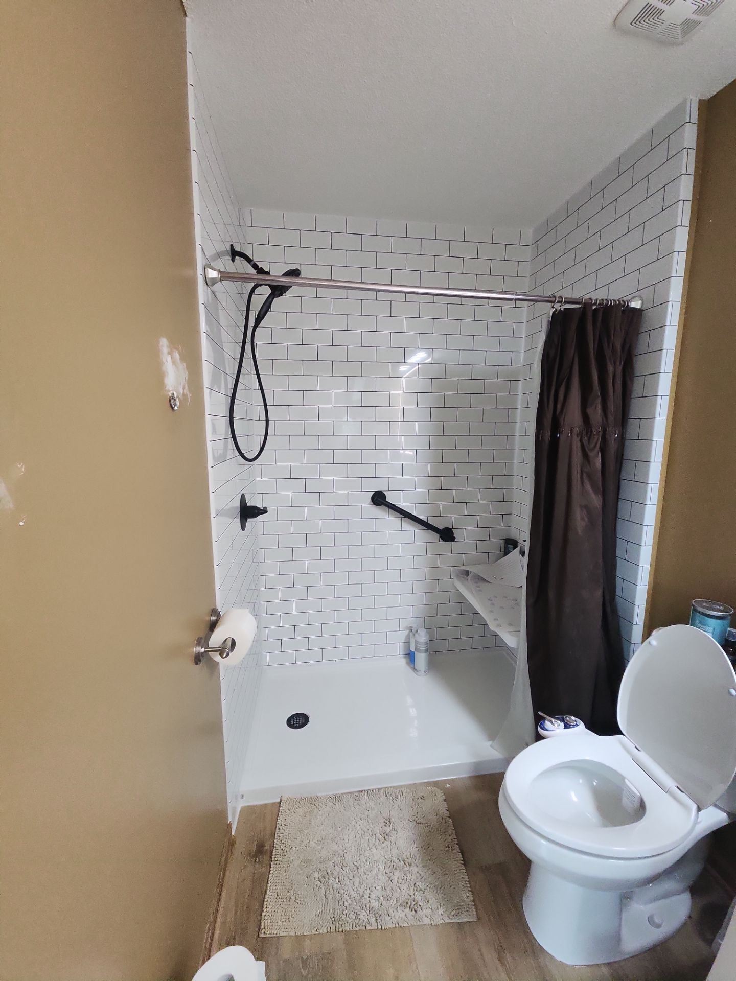 Bathroom Remodel using Luxury Vinyl Plank by The Shower Company