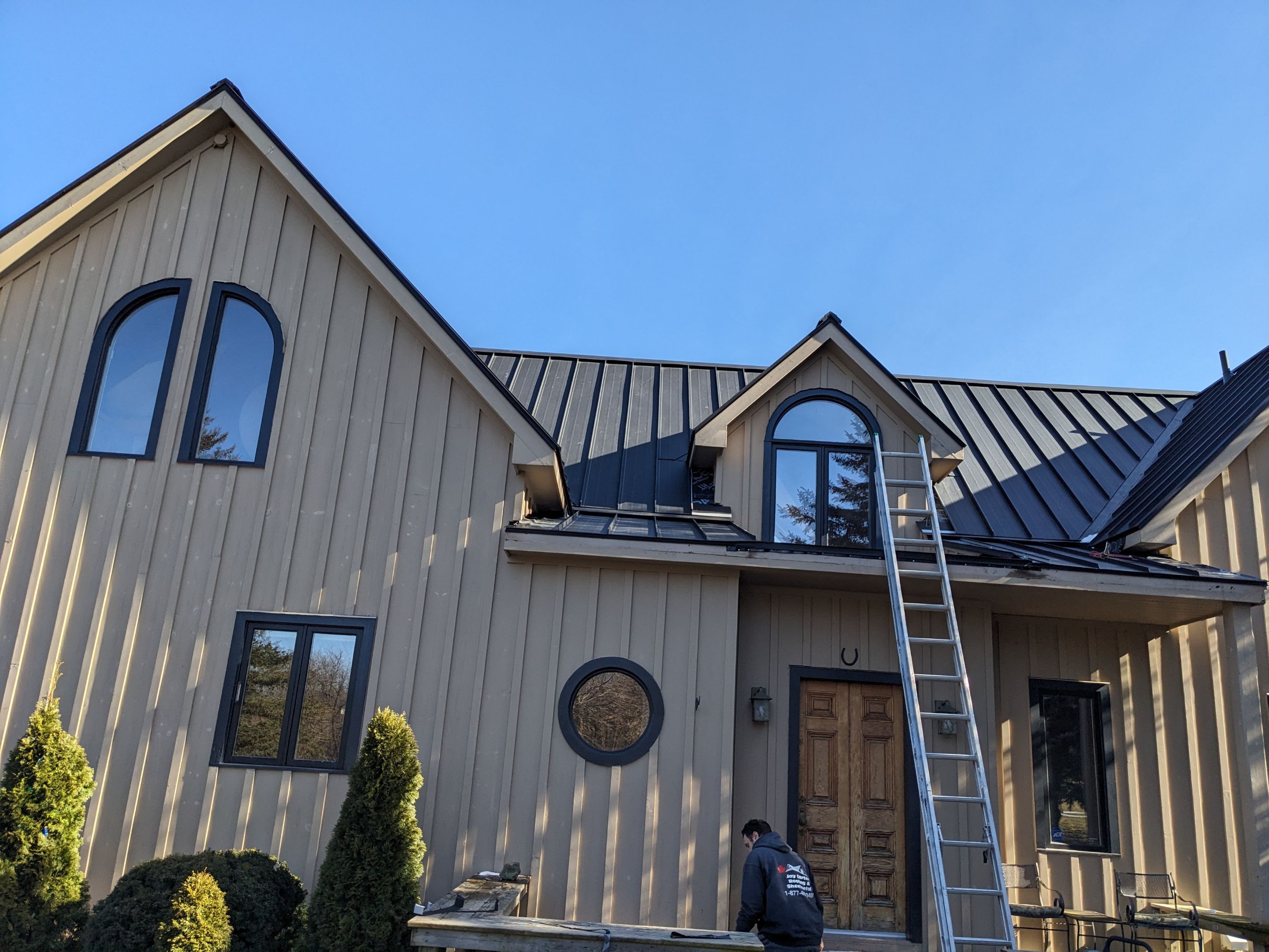 Residential Roofing Installation using 24 Ga Standing Seam Metal by Jay Carter Roofing & Sheet Metal