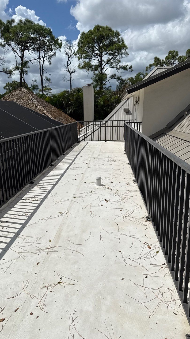 TPO Membrane- Trex Deck in Clam Shell color Balcony by Durabilis Roofing INC