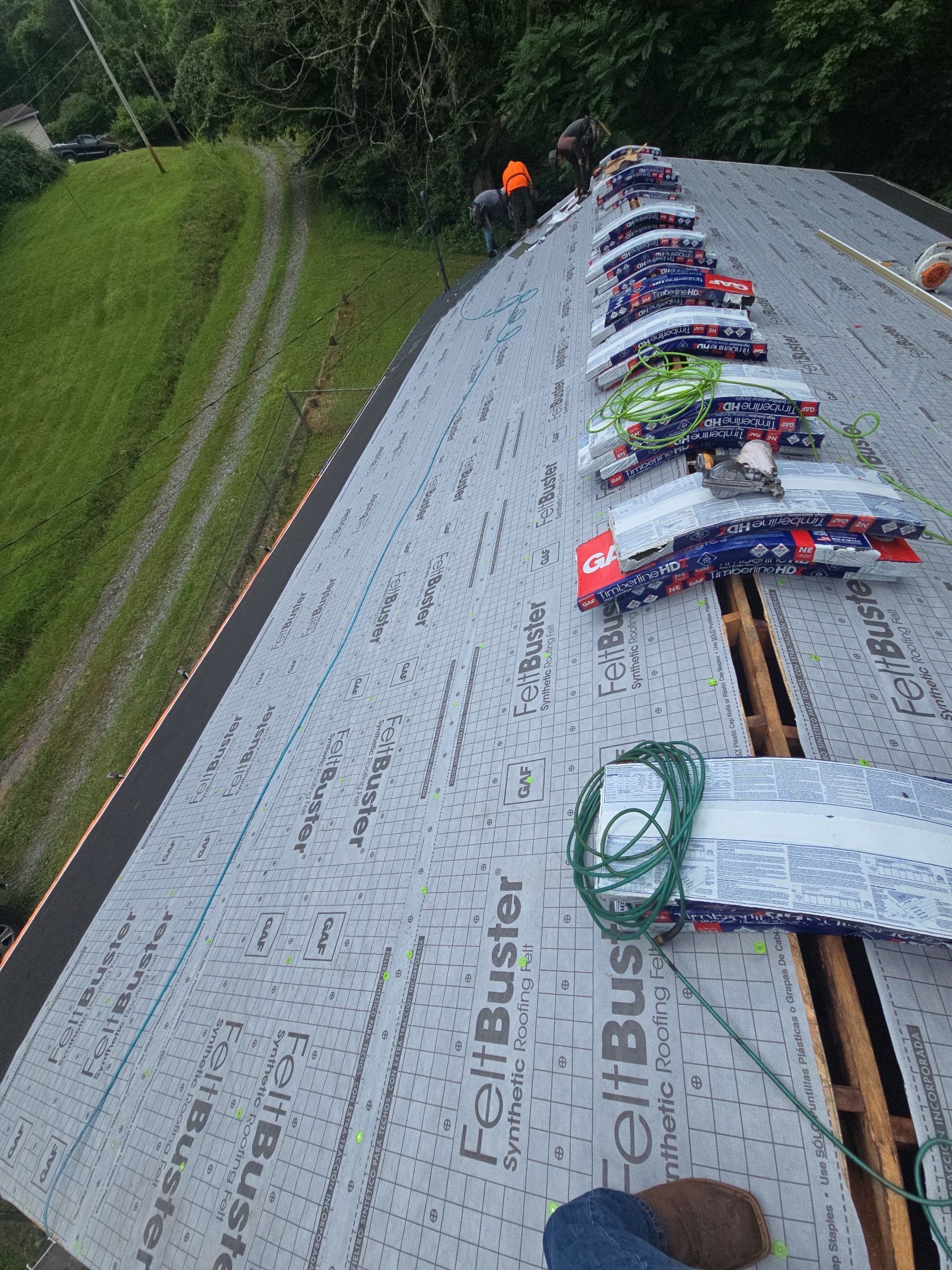 Residential Roofing Installation using GAF Timberline HDZ Charcoal by Rainstoppers Roofing