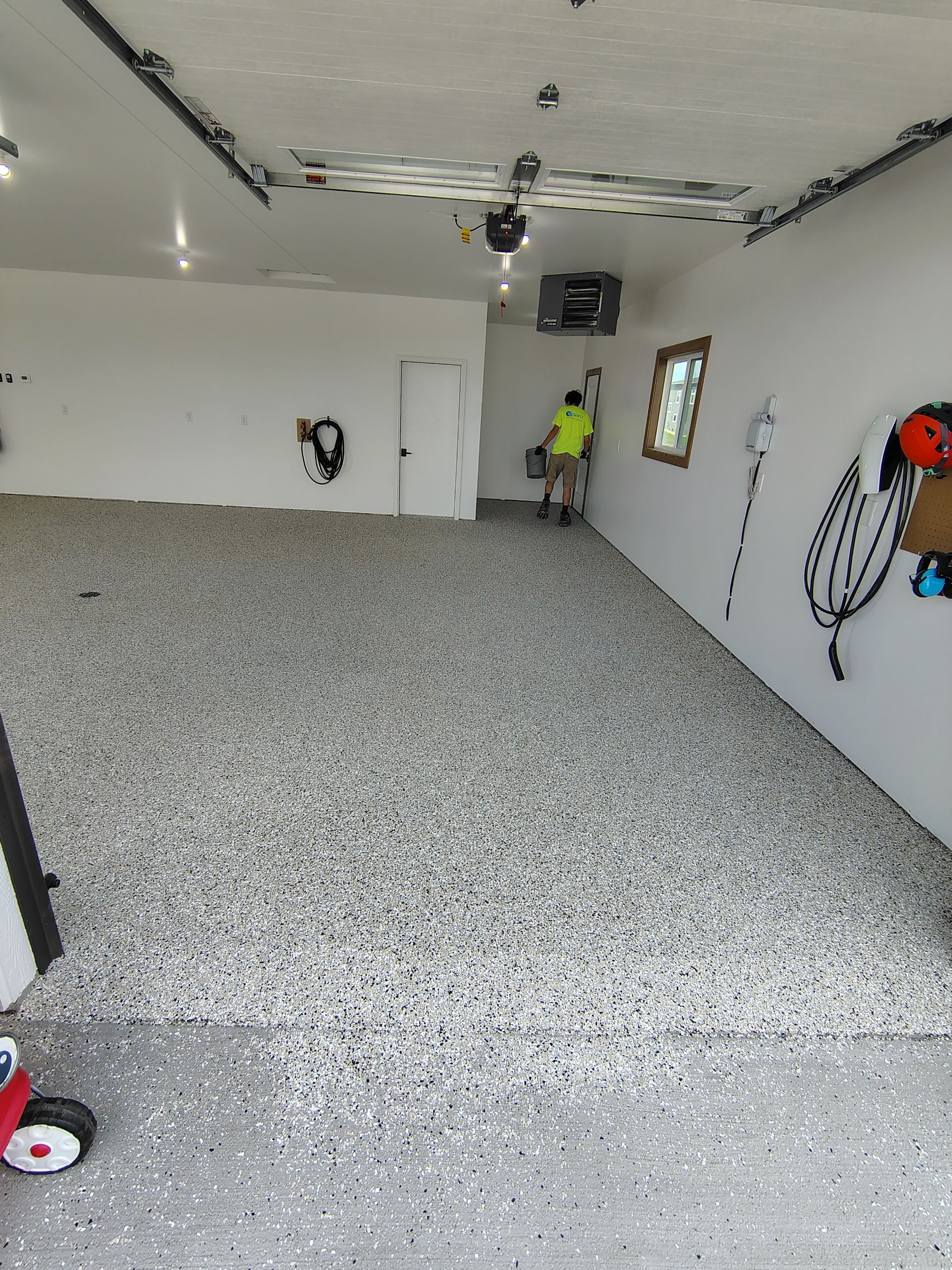 Gray and White Speckled Epoxy Garage Floor Coating in Tea by Select Painting, Coatings & Garage Cabinets
