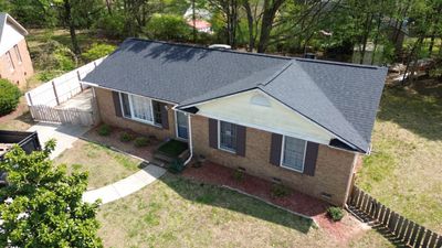 Roof and gutter replacement by hail damage