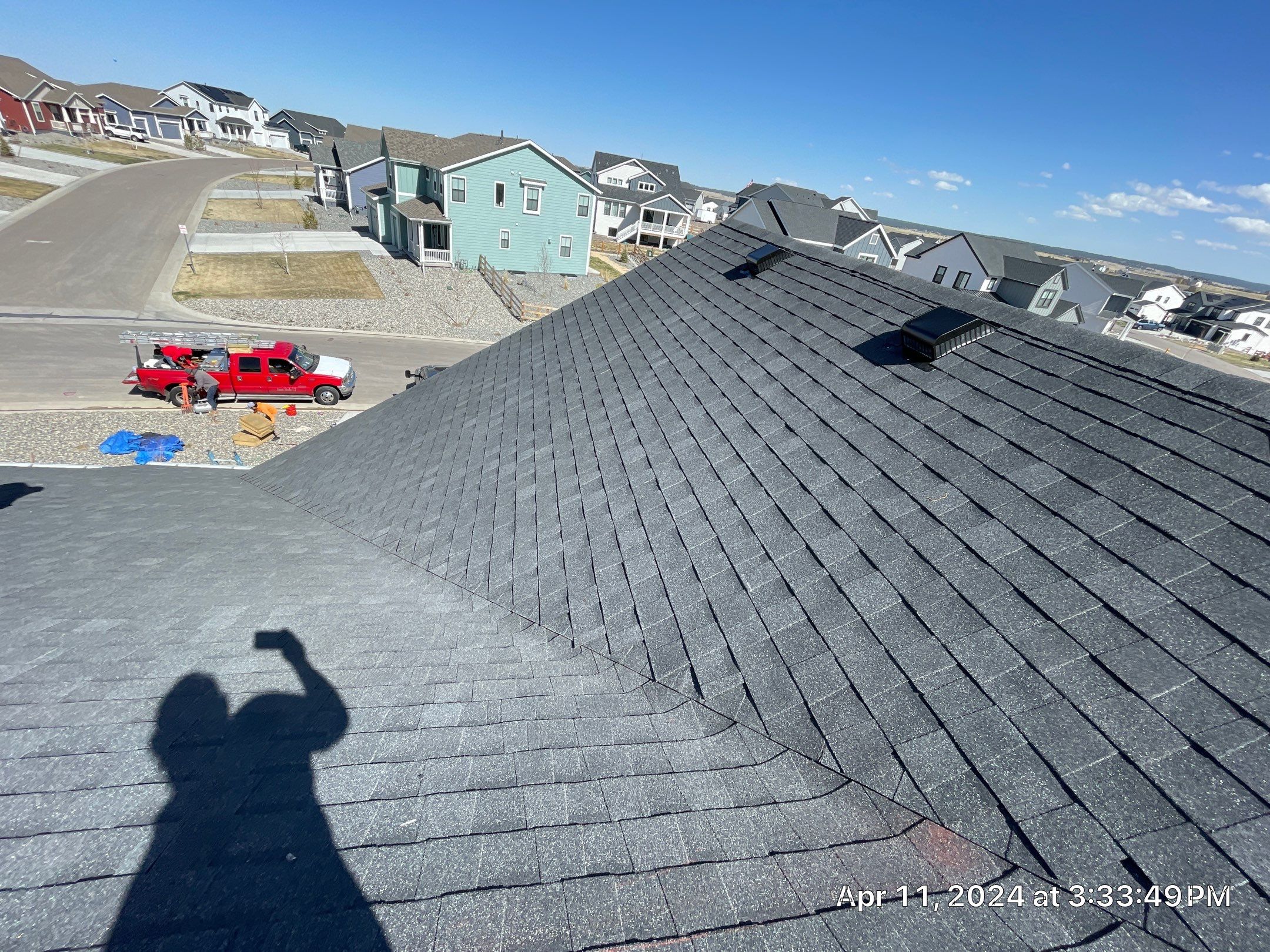 Residential Roofing Installation using Atlas Pinnacle Impact Black Shadow by Blue Peaks Roofing LLC 