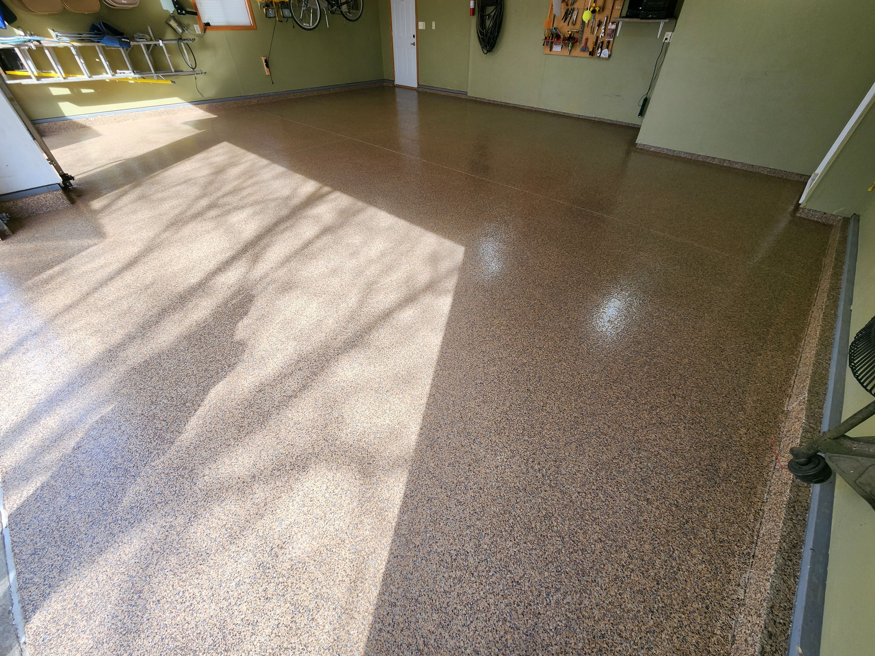 Sioux Falls Garage Floor Concrete Coating with Textured Aggregate by Select Painting, Coatings & Garage Cabinets