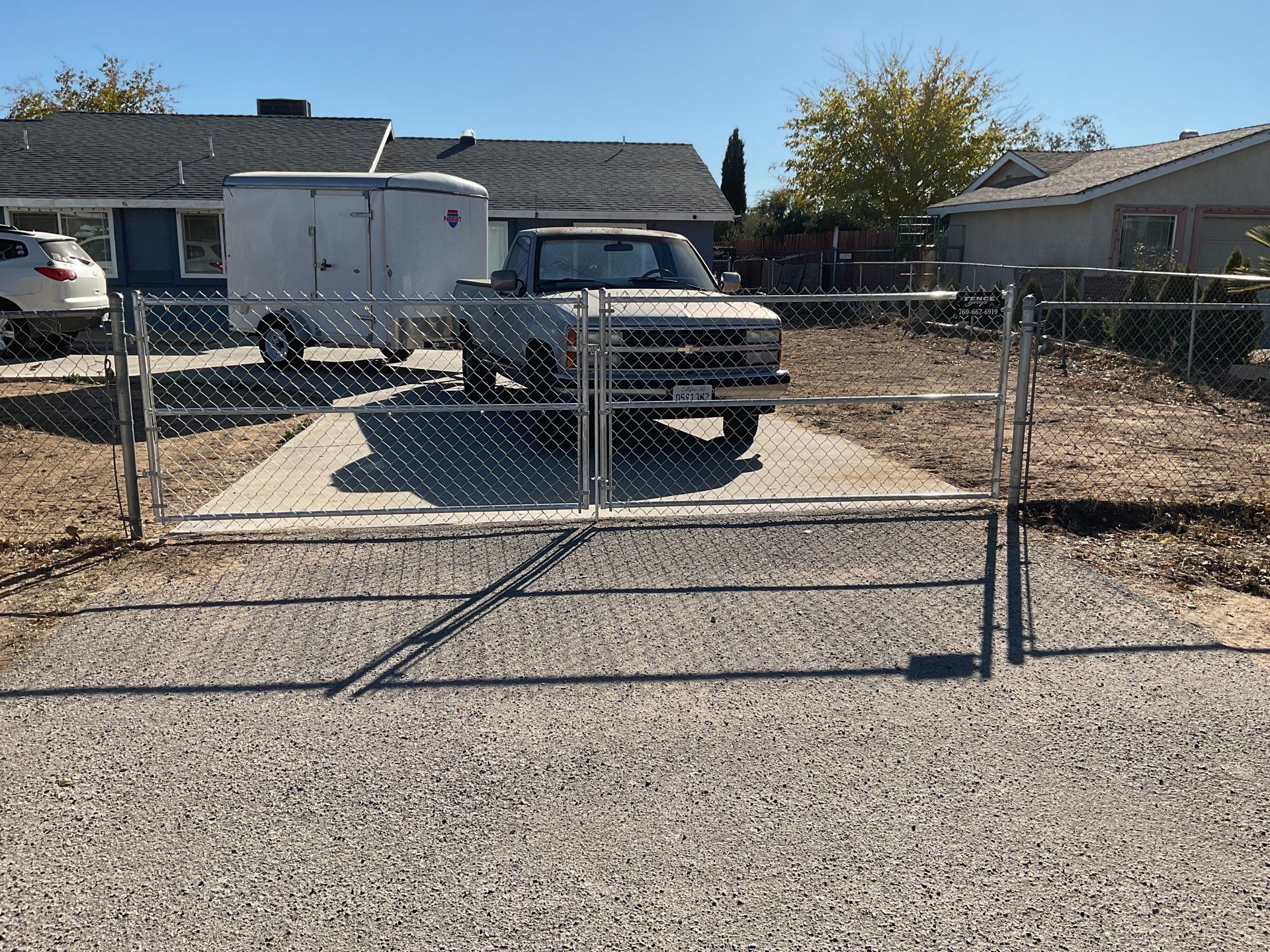 Fence Installation using vinyl and chain link  by Fence Guys Inc. 