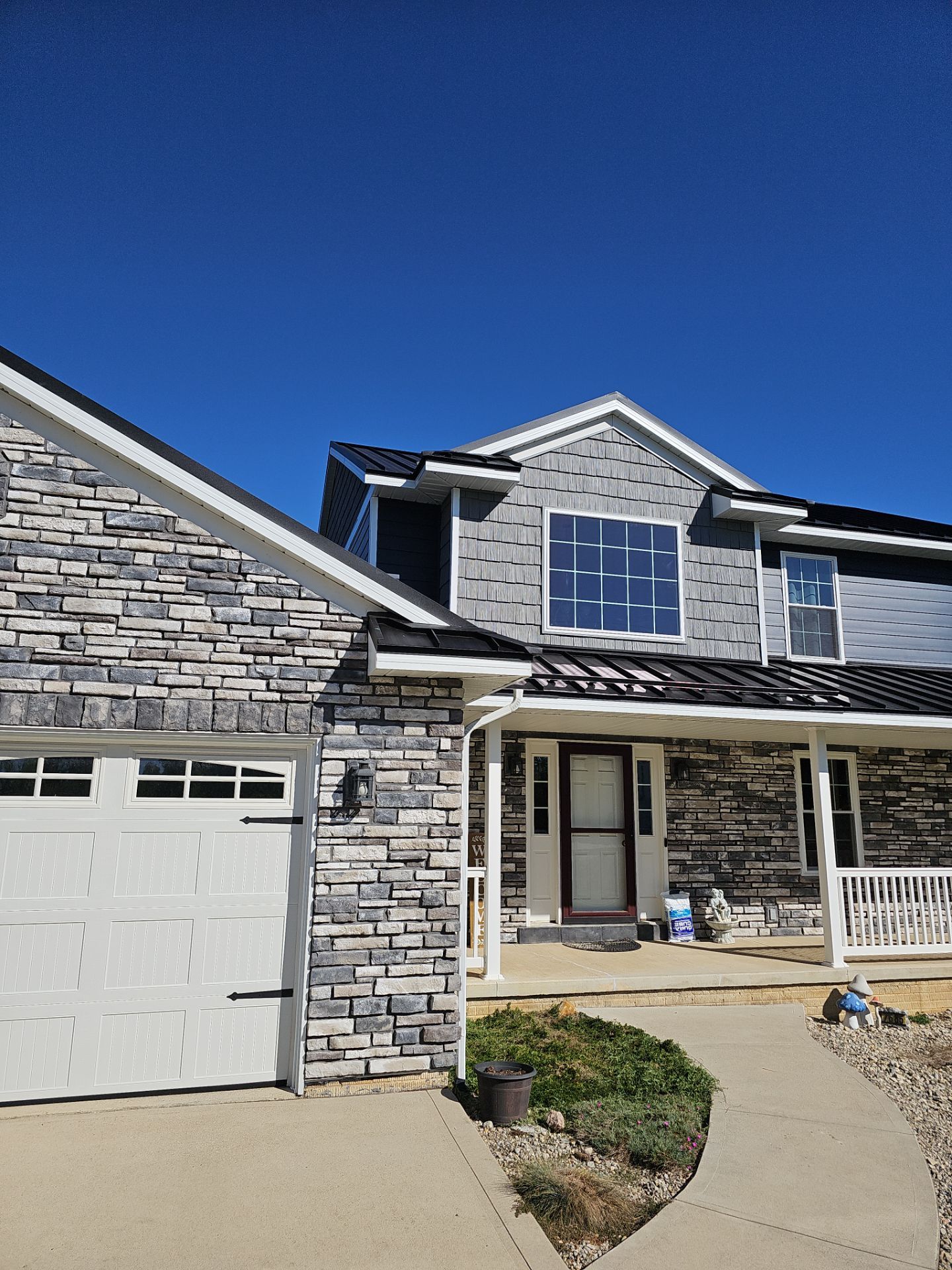 Jackson Center -Roof/Siding Replacement by Nitro Roofing and Construction