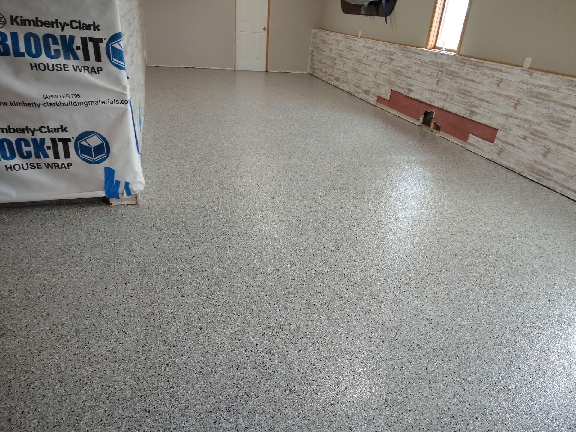 Maxwell, IA Coyote Flake Garage and Basement by Revival Concrete Coatings