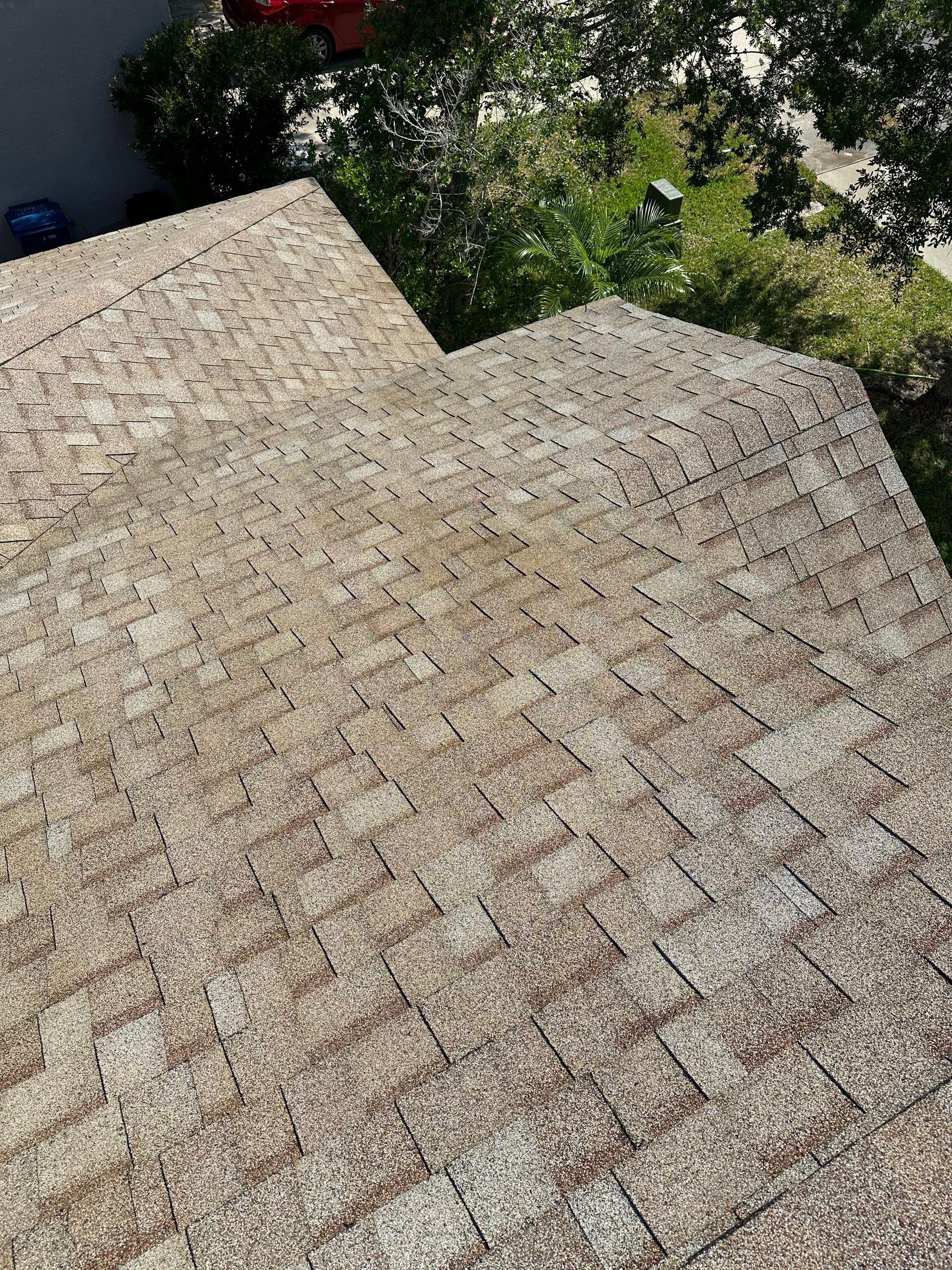 Asphalt Shingle Roof Soft Wash Cleaning & Concrete Pressure Washing in CopperStone Community, Parrish, FL by Sunshine AquaWash