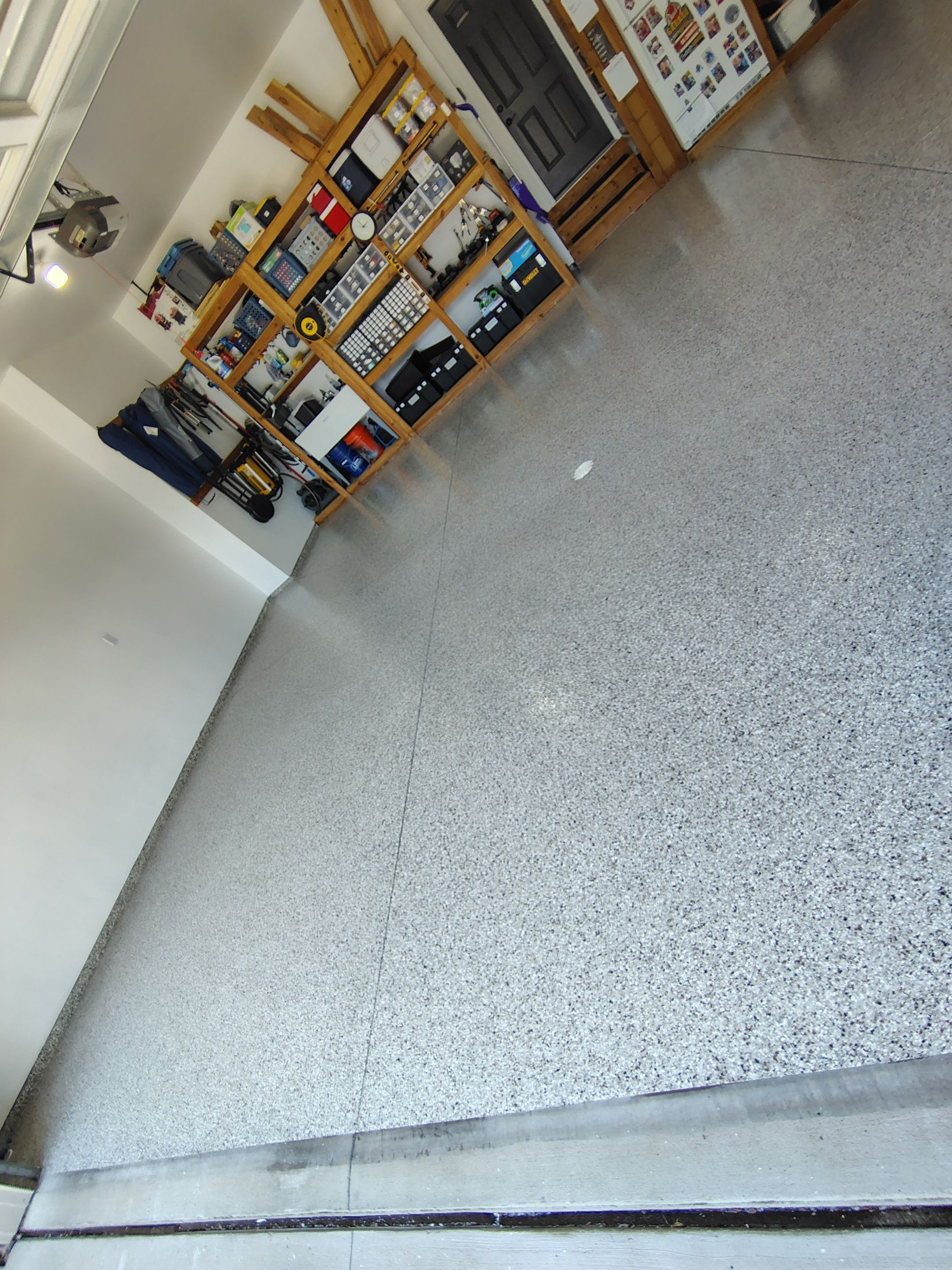 Coyote Garage Floor Coating in Sioux Falls by Select Painting, Coatings & Garage Cabinets