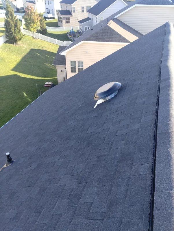 Residential Roofing Installation using Atlas Pinnacle Pristine Black Architectural Shingles by Frederick Roof Repair