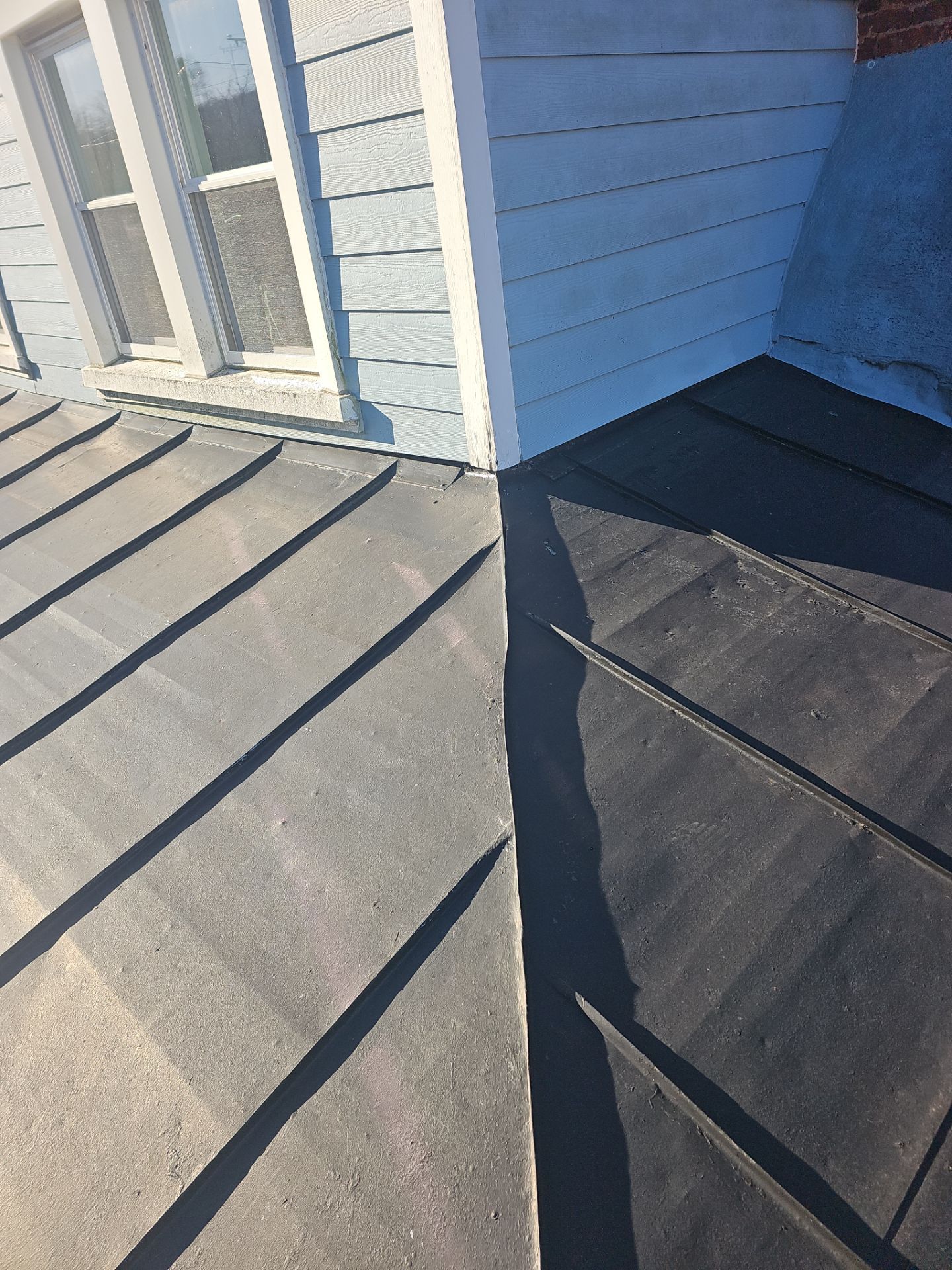 Metal Roof Replacement by Winchester Roofing
