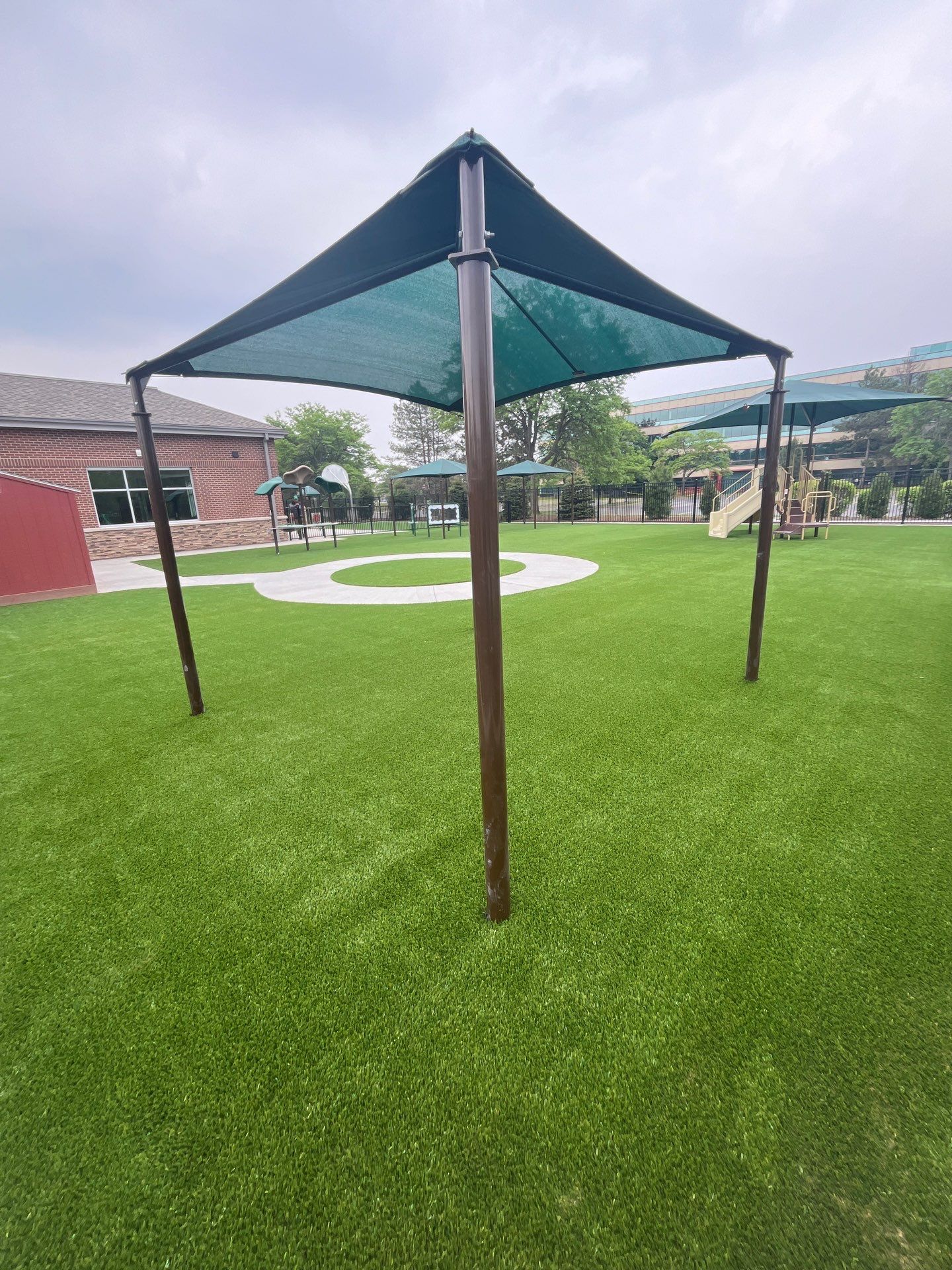 KinderCare of Lincolnshire Commercial Playground Turf Installation by Southwest Greens Midwest