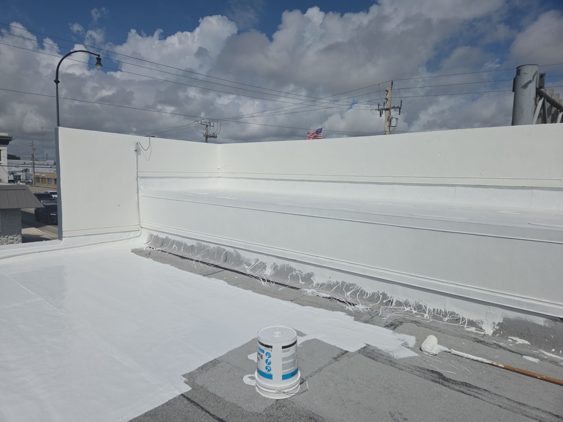 Commercial Flat Roof Restoration Using Silicone Coating in Hallandale Beach by Aastro Roofing